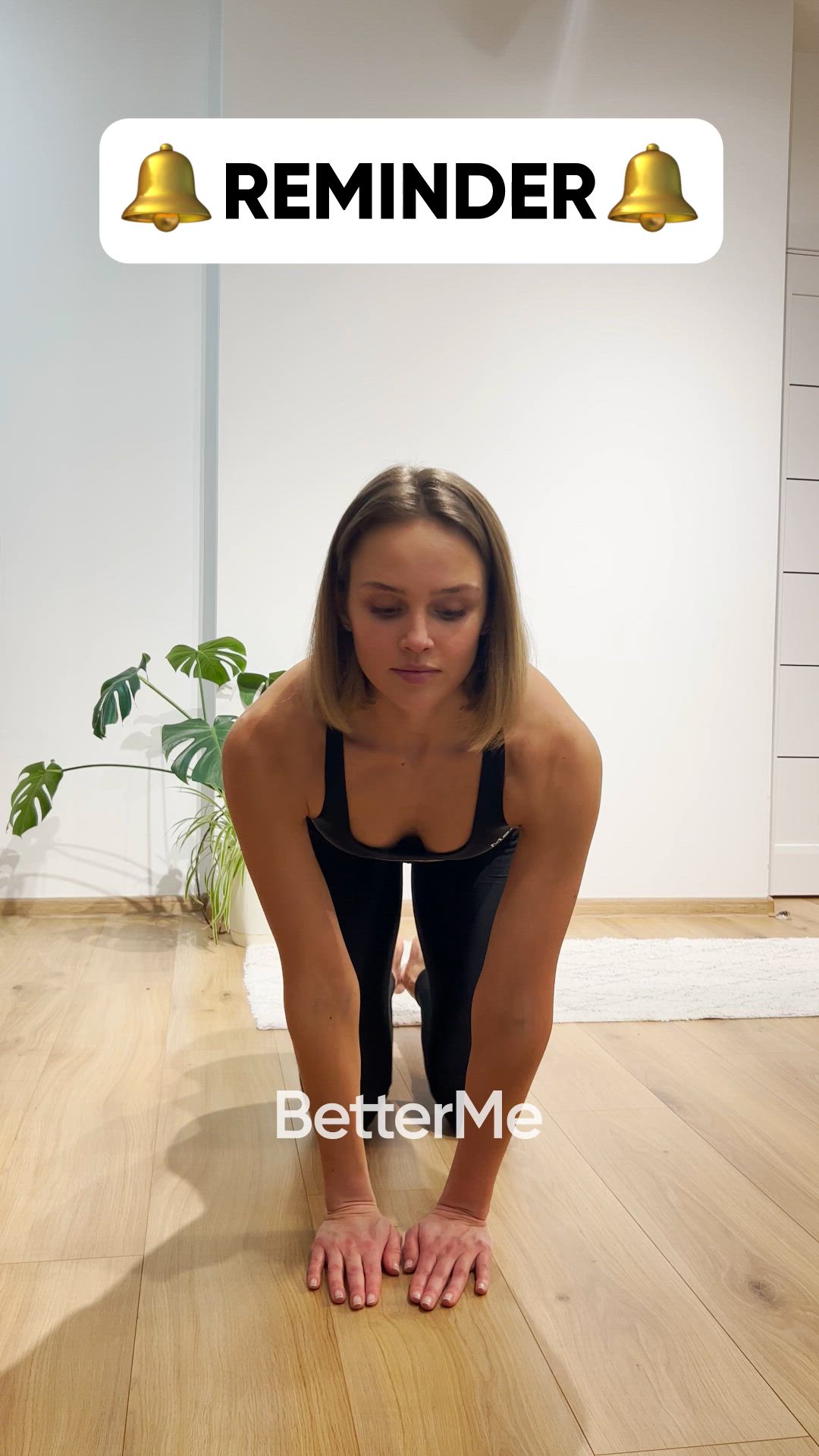 This may contain: a woman is doing yoga on the floor in front of a sign that says reminder