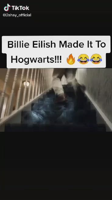 This may contain: someone is walking down the stairs with their feet on the ground and texting that reads, billie english made it to hogwarts