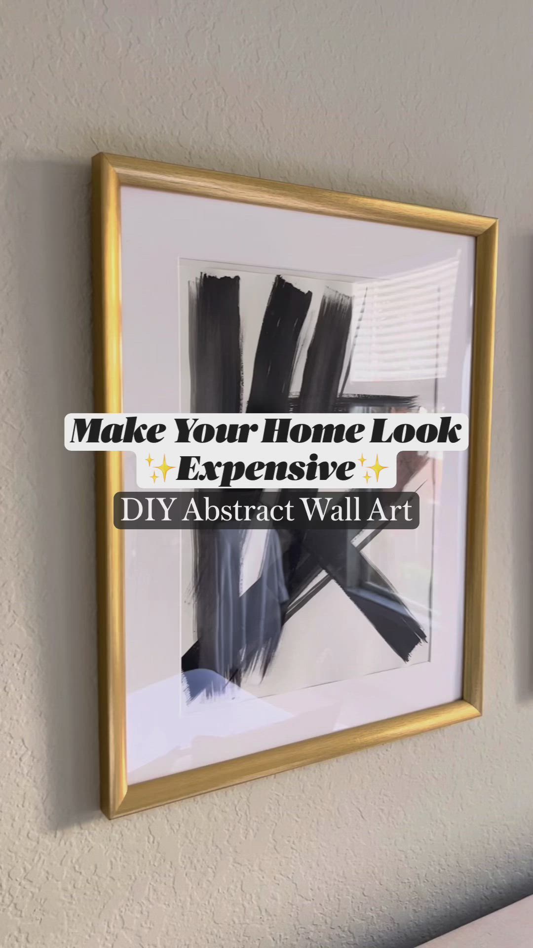 This contains an image of: Make your home look expensive with this DIY abstract artwork hack under 5 minutes!