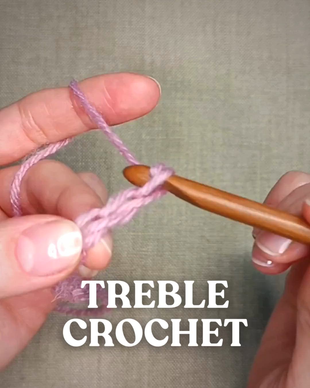 This may contain: two hands are holding a crochet hook and knitting yarn with the words treble crochet on it