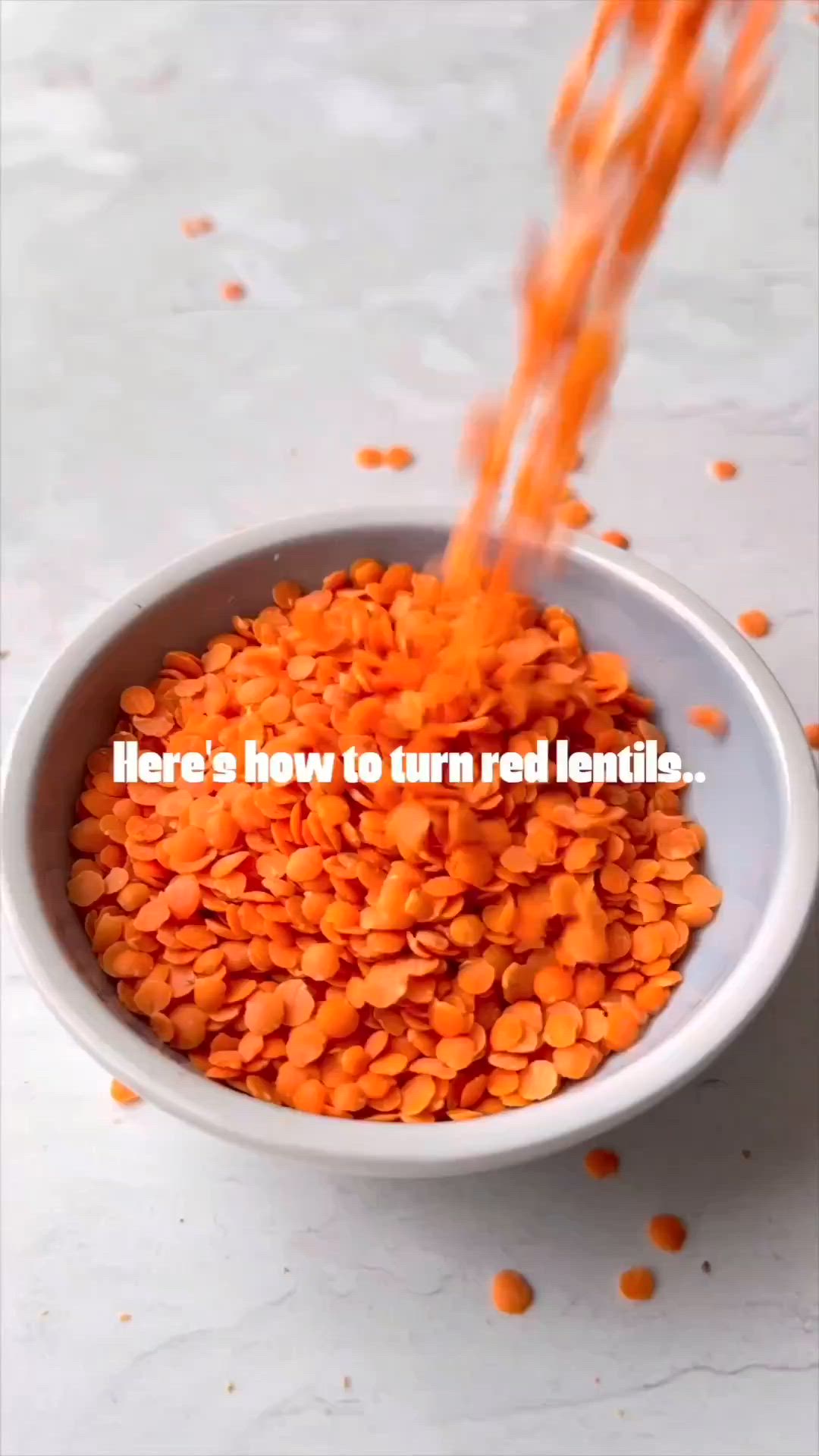 This may contain: there is a bowl full of carrots with the words here's how to turn red lentils