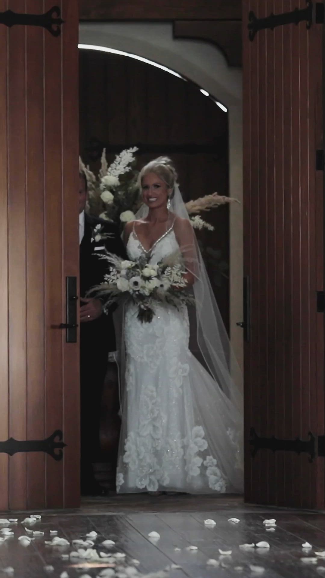 This may contain: a man in a tuxedo smiles as he waits for his bride to walk down the aisle