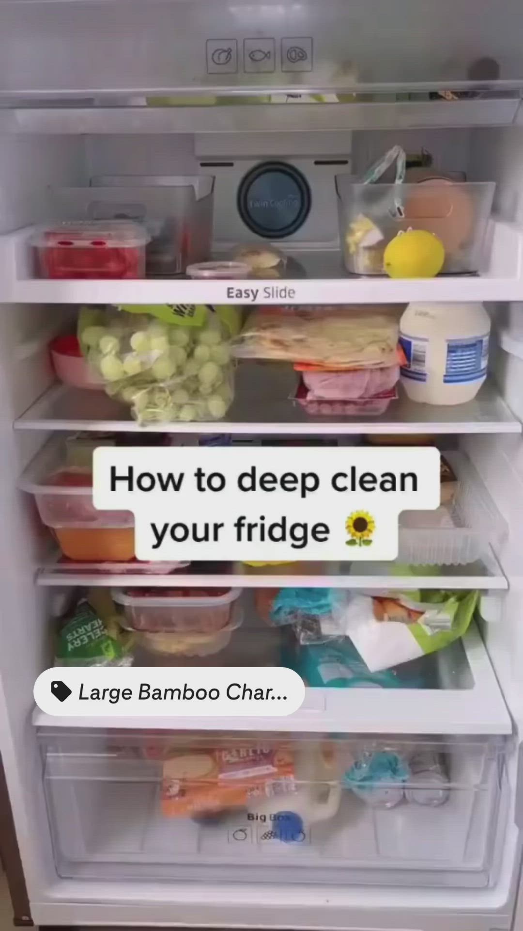 This may contain: an open refrigerator with the door wide open and labeled how to deep clean your fridge