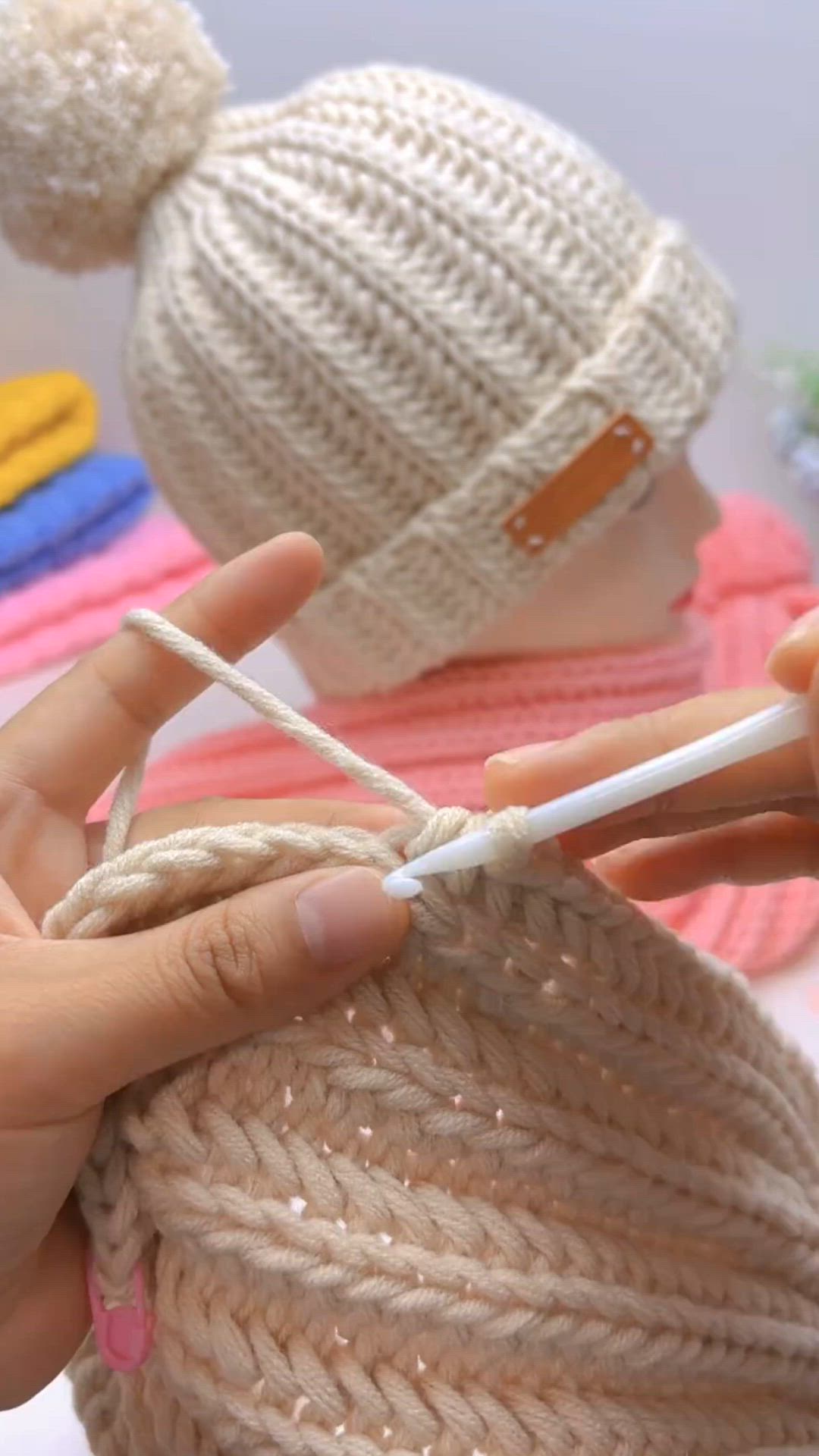 This contains: Craft a sweet baby hat with a free tutorial from @woolenmiracle.0313 on TikTok