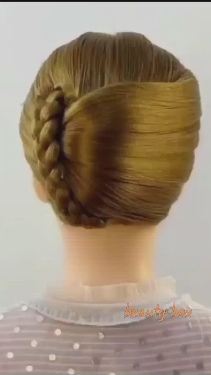 This contains an image of: Easy BUN HAIRSTYLE