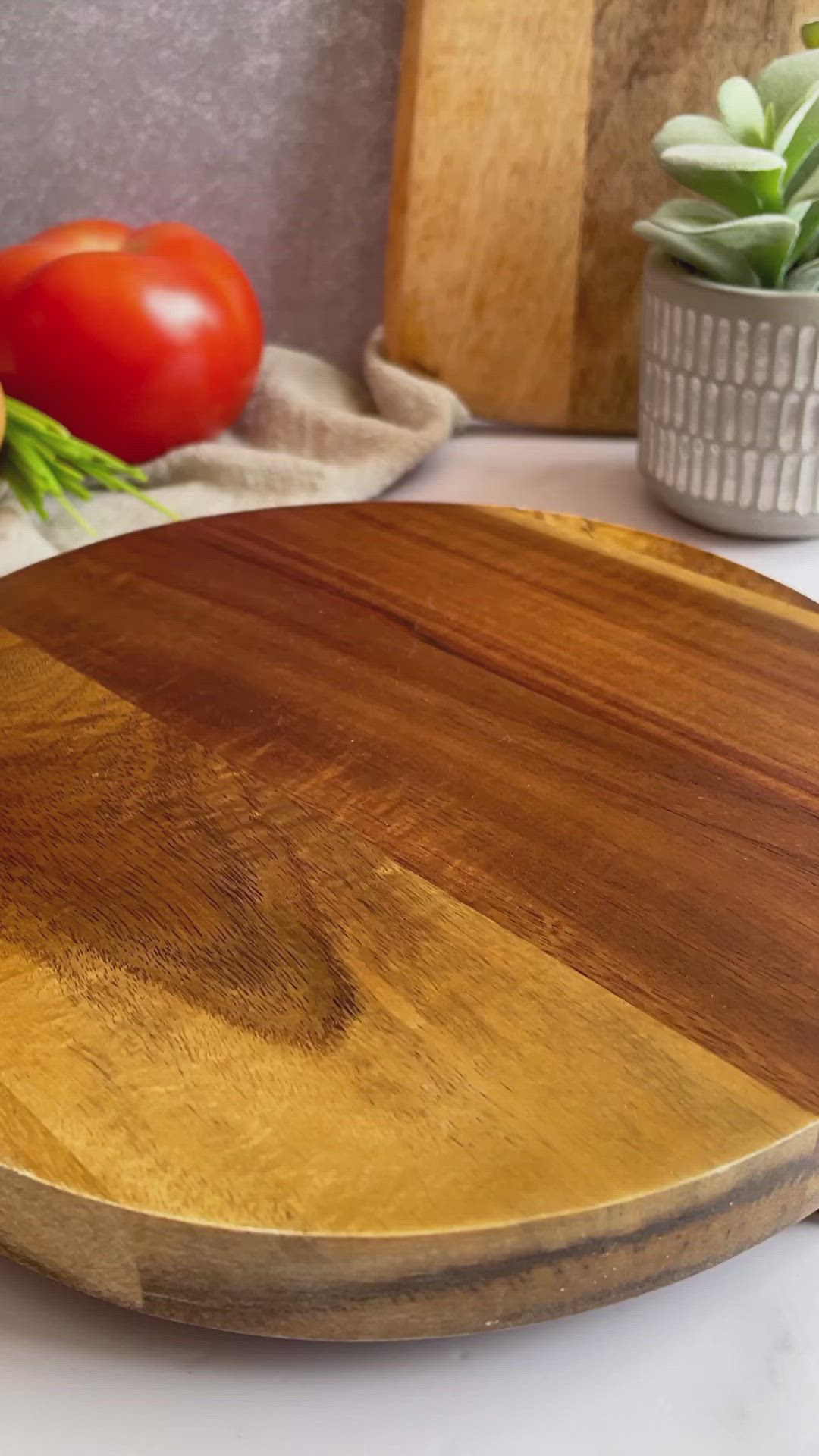 This may contain: a wooden plate topped with a quesadilla on top of a cutting board