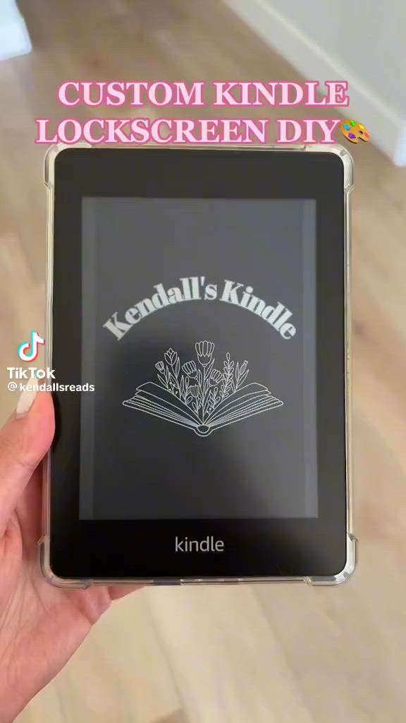 This may contain: someone is holding up a kindle to show the screen on their hand and it says, custom kindle lockscreen diy