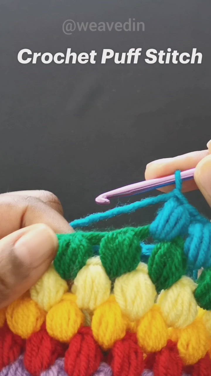 This may contain: the crochet puff stitch is being worked on by someone using a knitting needle