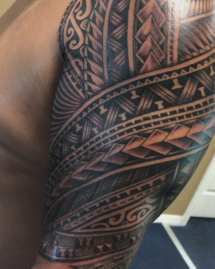 This contains an image of: Polynesian half sleeve 