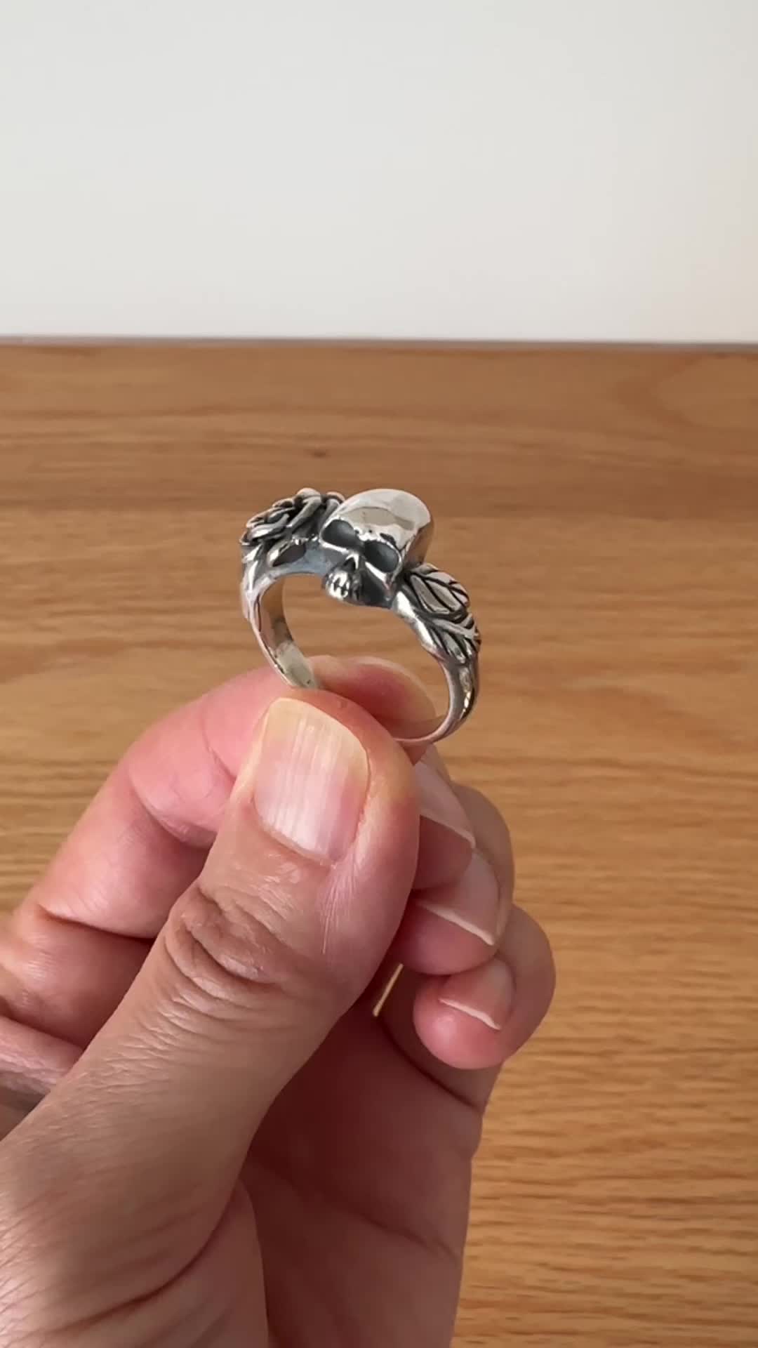 This contains an image of: Sterling Silver Rose and Skull Ring