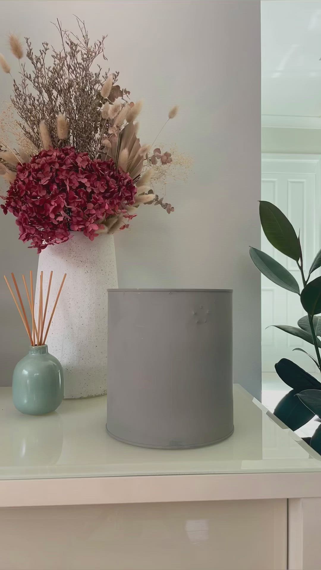 This contains an image of: Upcycled Paint Tin Planter