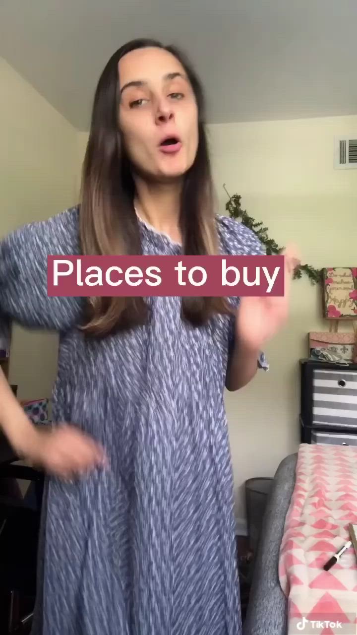 This may contain: a woman standing in front of a bed with the words places to buy cheap books online