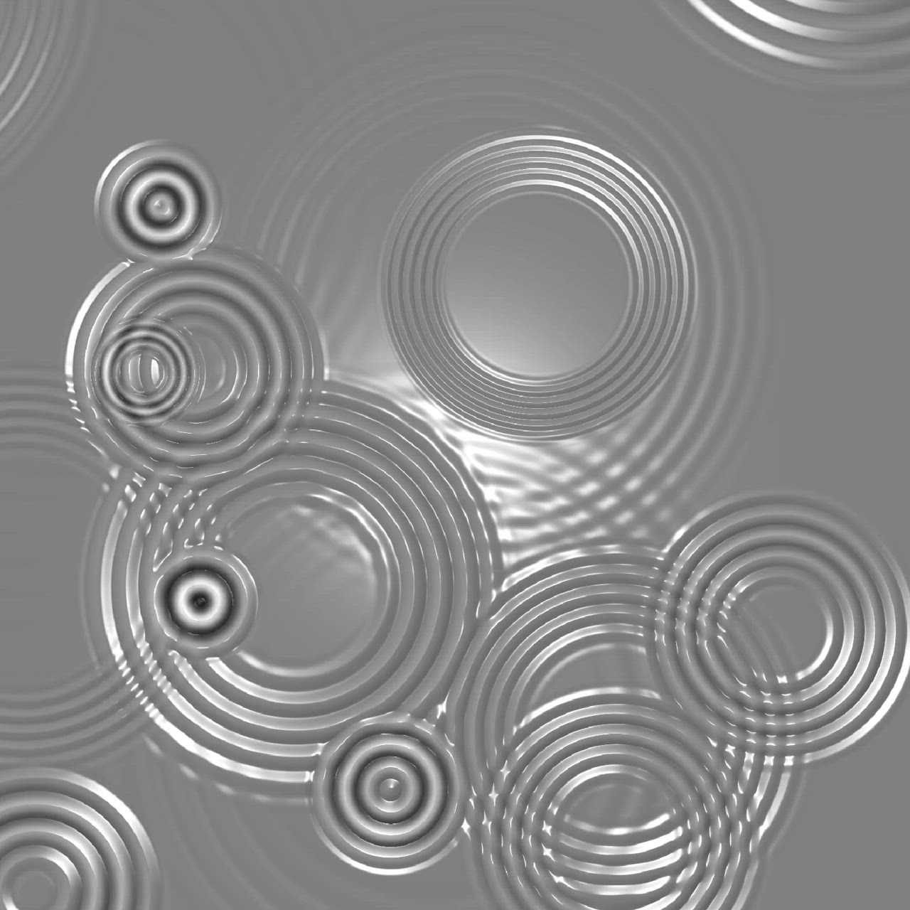 This may contain: an abstract silver background with circles in the middle and one circle at the center,