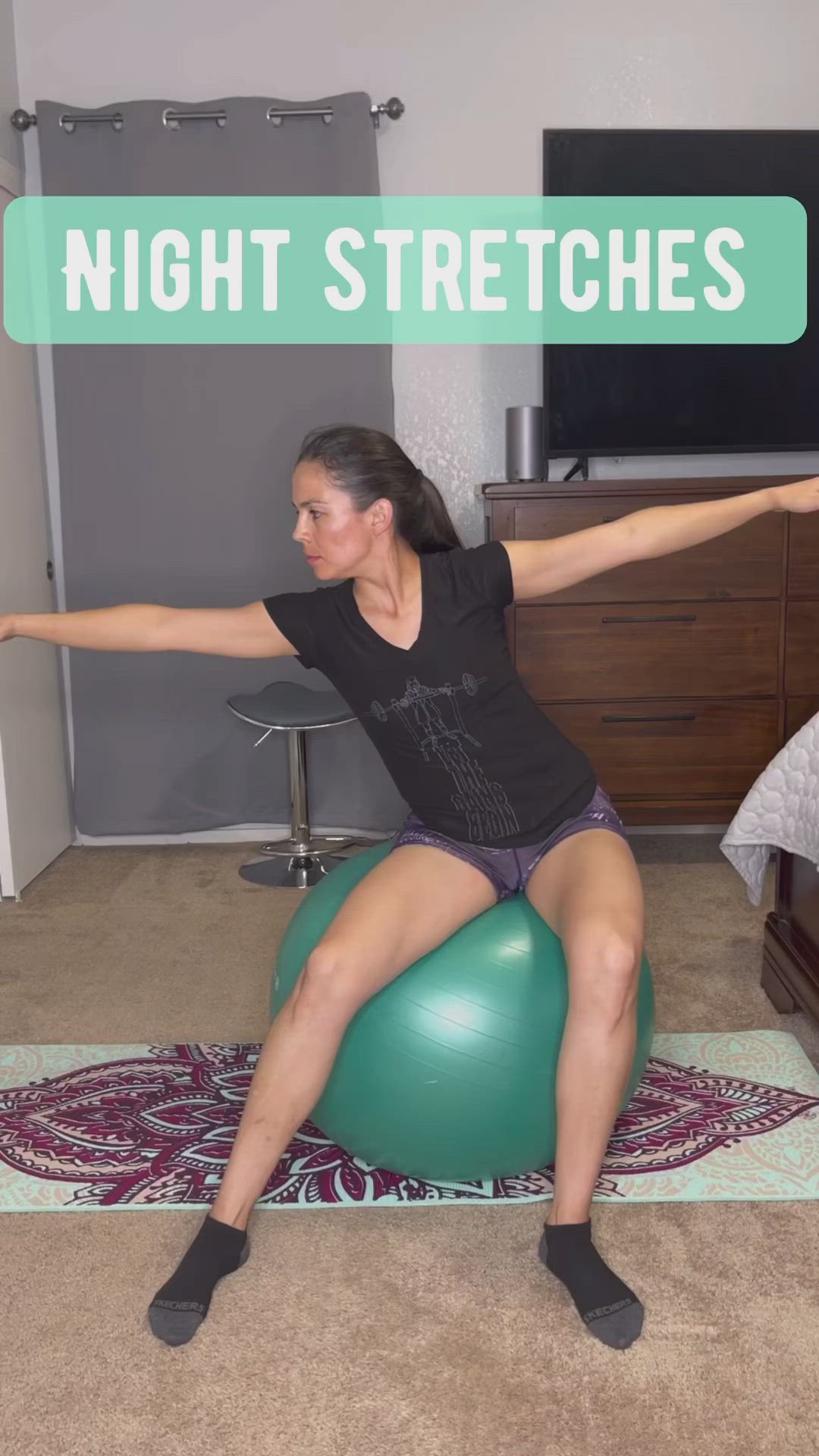 This may contain: a woman is sitting on an exercise ball and stretching her arms with the words night stretches above her