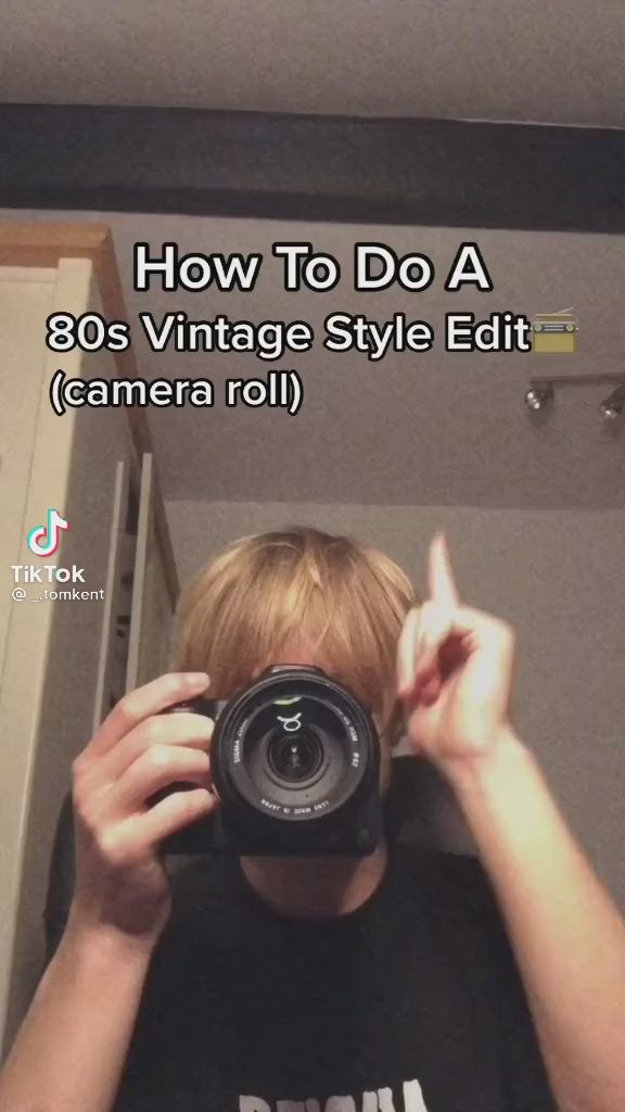 This may contain: a man taking a selfie in front of a mirror with the words how to do a 80's vintage style edit camera roll