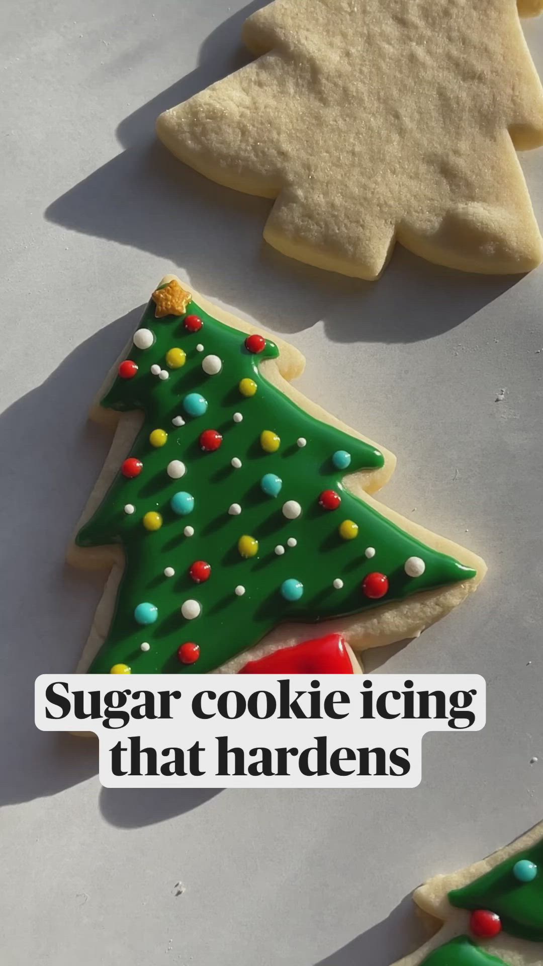 This may contain: sugar cookie icing that has been decorated with christmas trees