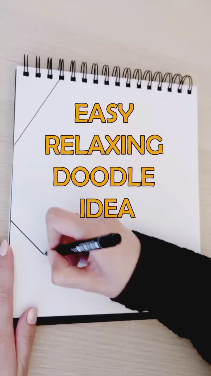 This may contain: a person writing on a notebook with the words easy relaxing doodle idea written below