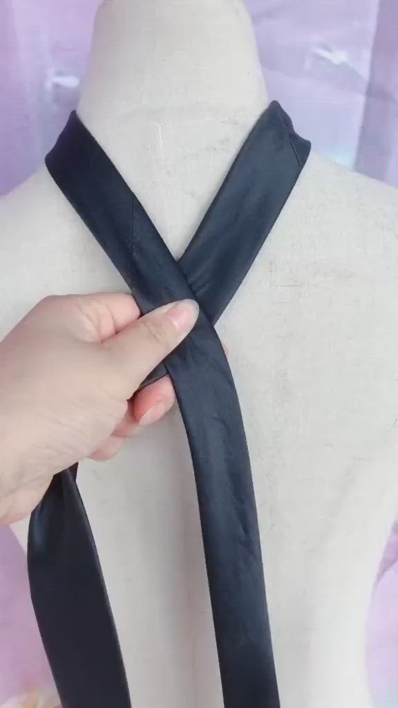 This contains an image of: Wear a tie like this Tie knot hacks trick