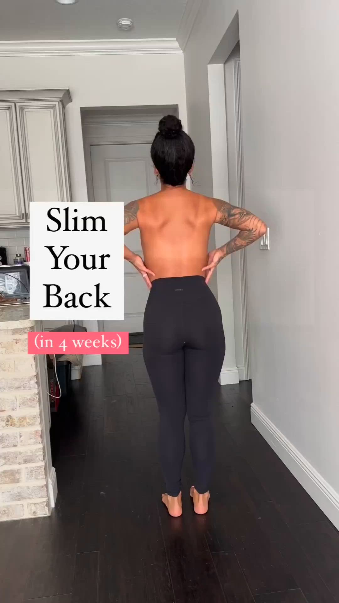 This may contain: a woman standing in front of a sign that says slim your back