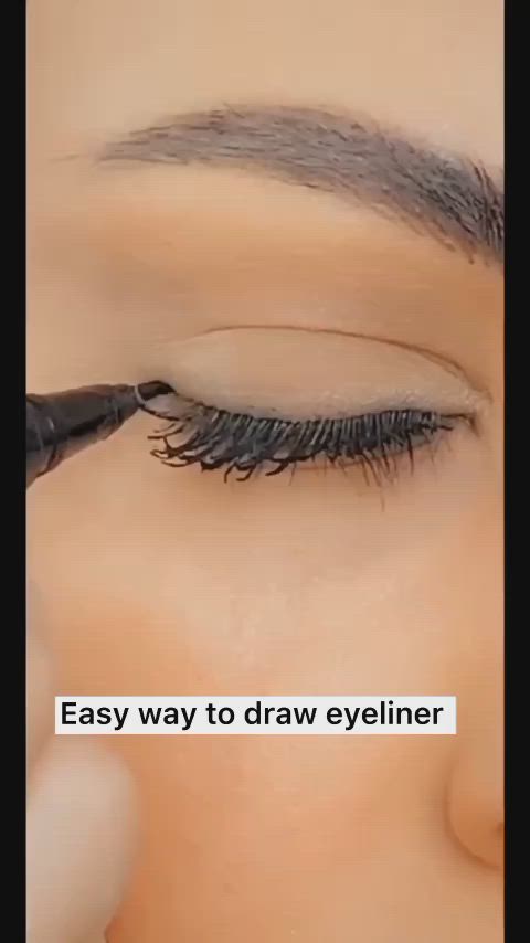 This contains an image of: Eyeliner trick