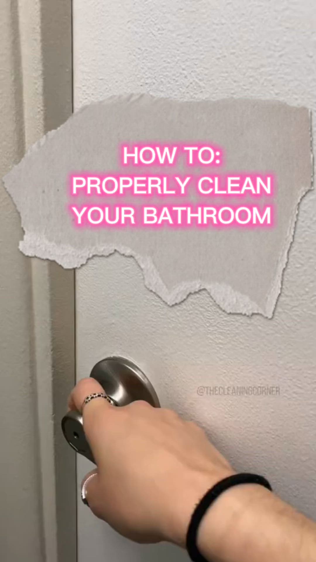 This may contain: someone is opening the door to their bathroom with pink text on it that reads, how to properly clean your bathroom