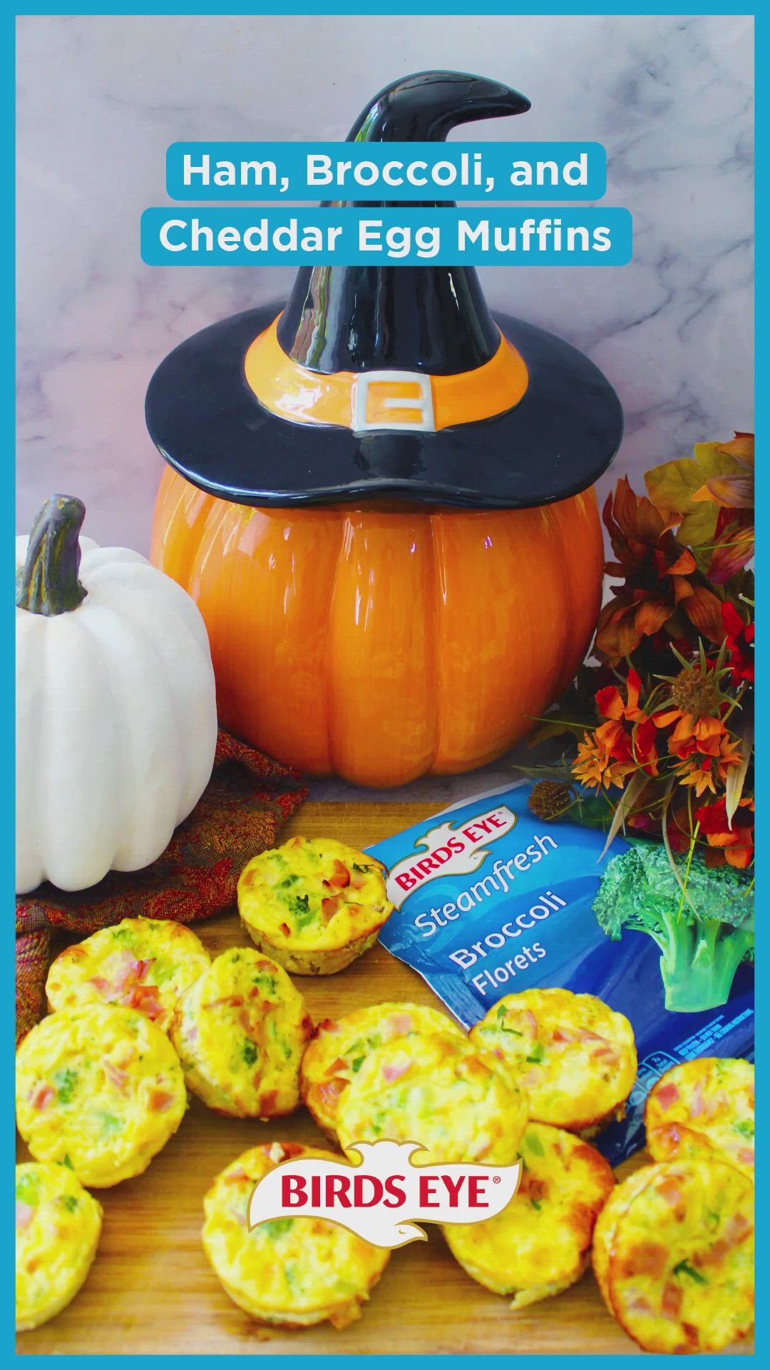 This may contain: an egg muffin is on the table next to other food items and pumpkins