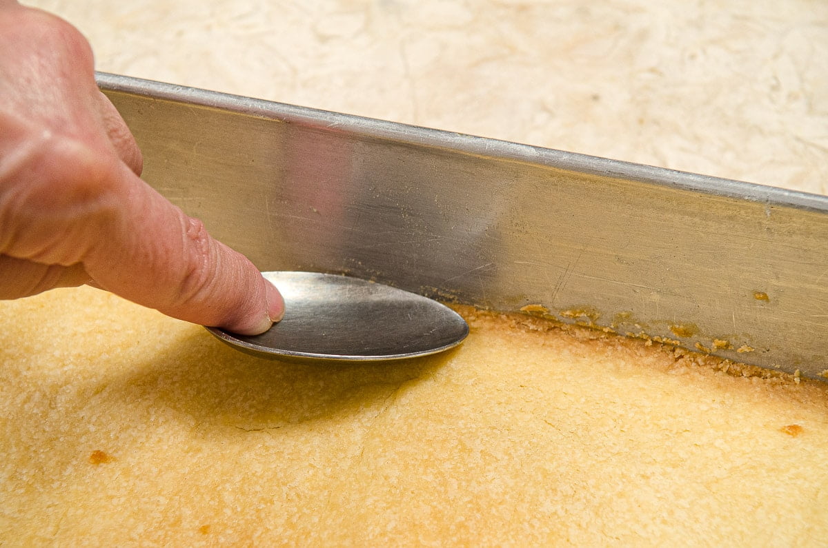 Sealing the Crust to the side of the pan