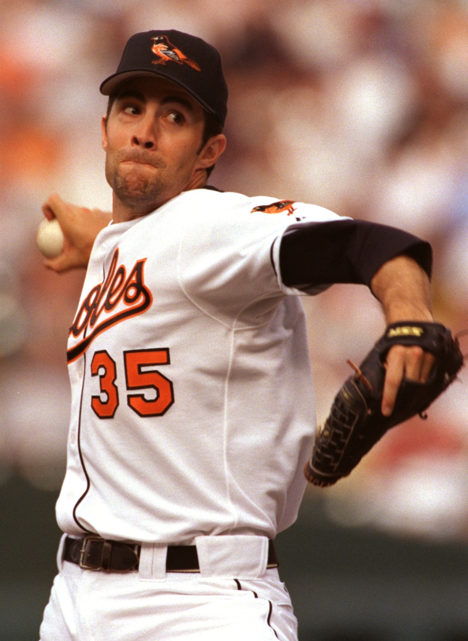 Mike Mussina delivers a pitch on opening day in 2000 at Camden Yards. (Karl Merton Ferron/Staff. (Photo)