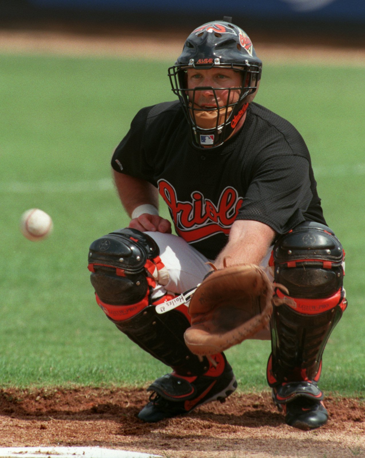 FT. LAUDERDALE, FLA--Mar 3, 1997--Orioles' catcher #23, Chris Hoiles, wearing a new catcher's mask. Photo by Kenneth K. Lam/staff