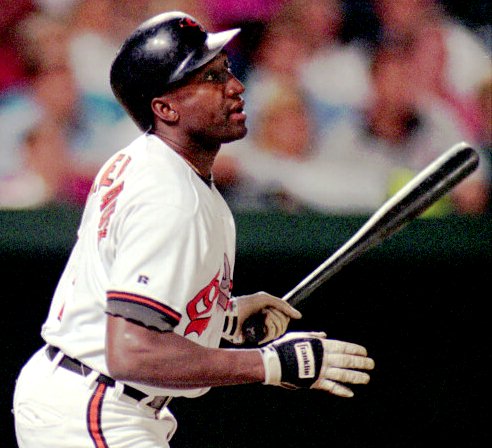 (MET--Orioles/13) BALTIMORE, Sept. 12--WATCHING IT GO--Baltimore Orioles batter Mike Devereaux follows through on his three-run home run in the third inning. (MainMetro)(20036stf/KARL M. FERRON) 1993