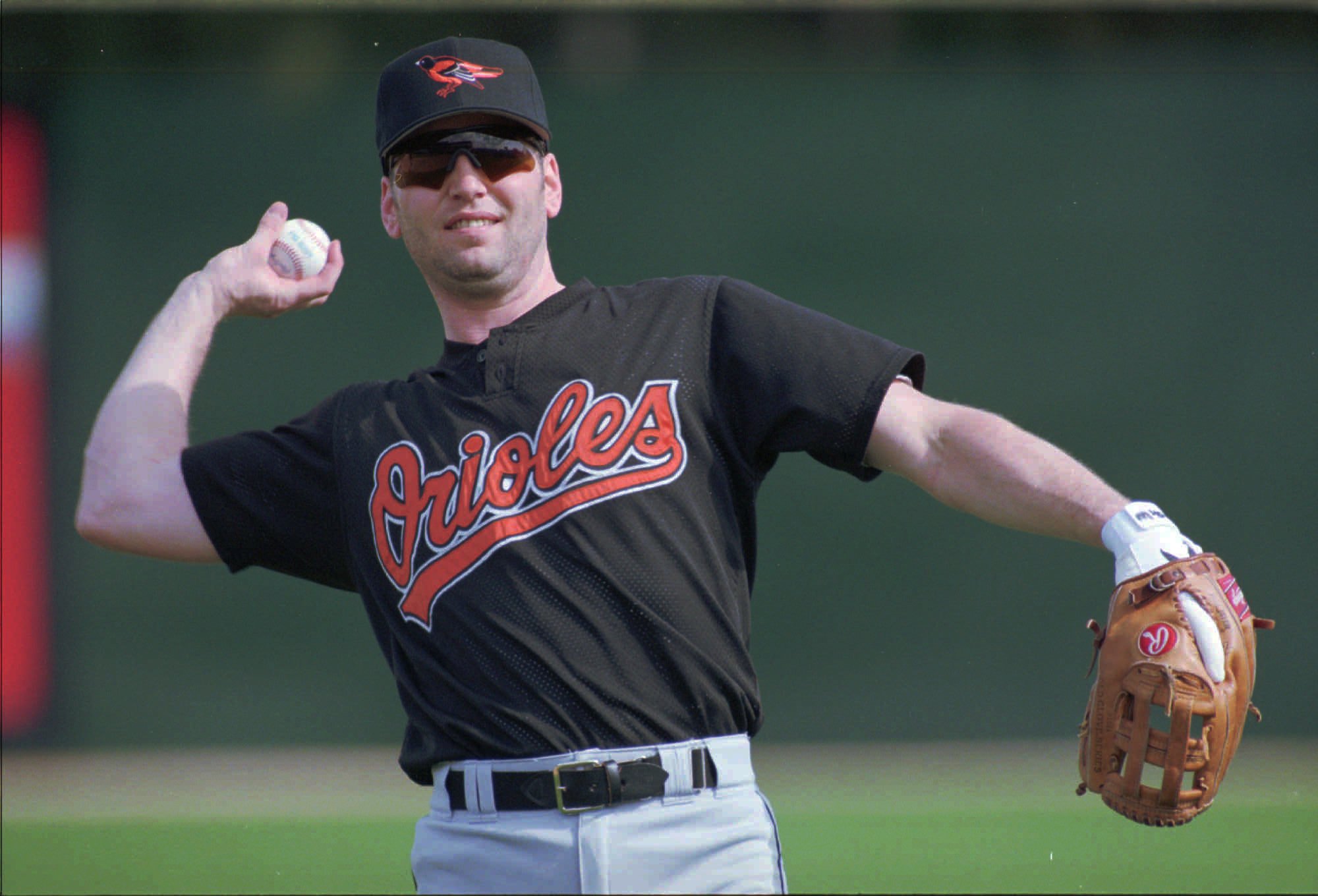 Baltimore Orioles spring training invitee infielder Billy Ripken makes warmup tosses during the Orioles' spring training workout for pitchers and catchers Tuesday, Feb. 20, 1996. (Baltimore Sun/Karl Merton Ferron)