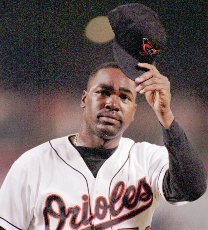 BALTIMORE, MD.--JULY 13, 1995-- The Orioles' Arthur Rhodes tips his cap to the crown at Camden yards after pitching over seven innings and giving only one run during his relief effort against the Royals. However, the Orioles' closer Doug Jones blew the save and lost the game by score of 9 to 8 in the ninth inning. photo by Kenneth K. Lam/staff