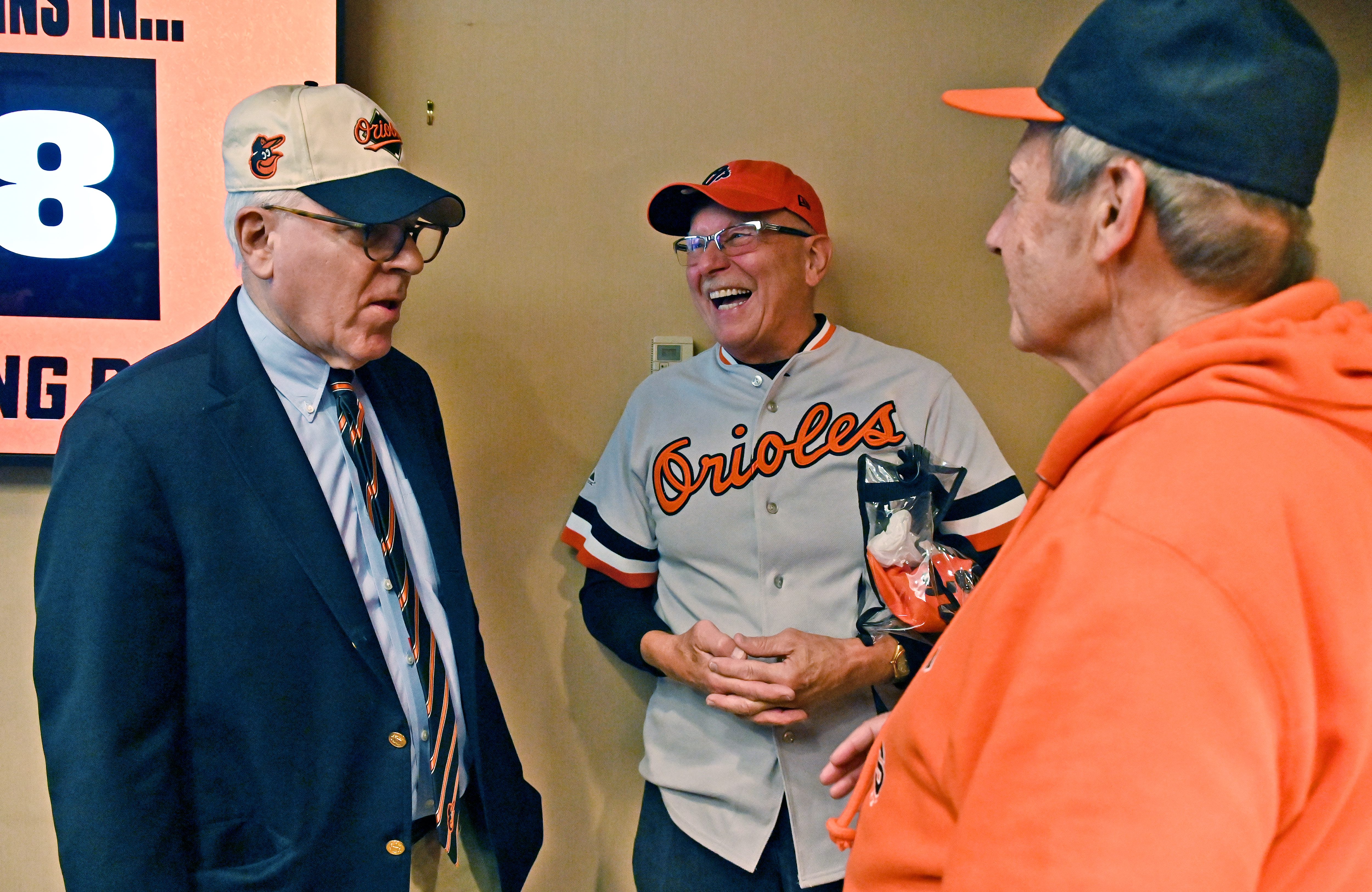 Mar. 28, 2024: From left, new Baltimore Orioles owner David Rubenstein meets Bruce Myers, of Little River, SC, and his friend, right, Jerry Martz, of Leeland, NC, before the Orioles host the Los Angeles Angels at Oriole Park at Camden Yards on opening day. (Kim Hairston/Staff)