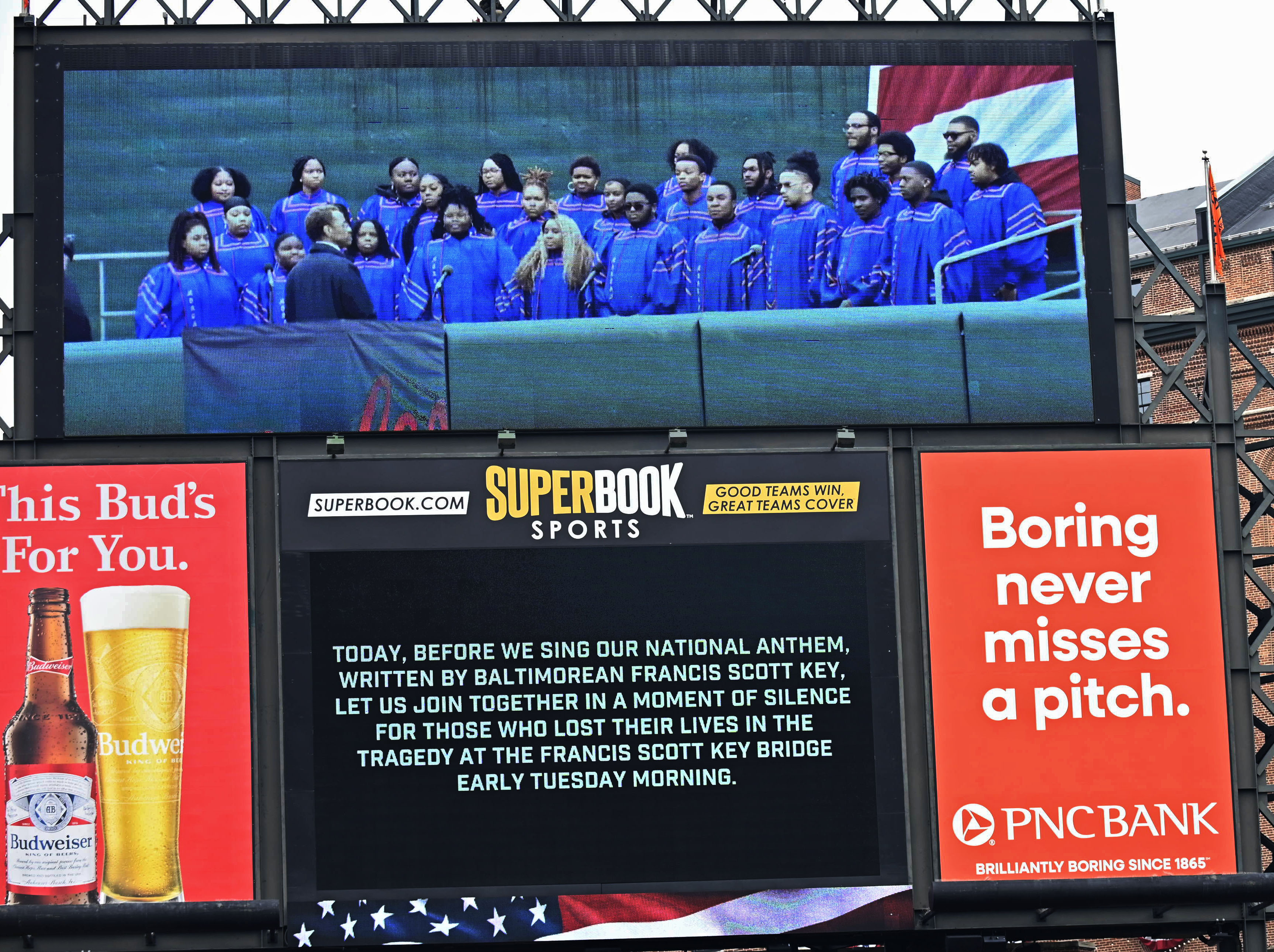 Mar 28, 2024: The Orioles announces the observance of a moment of silence for the victims of the Key Bridge tragedy during opening day ceremony at Oriole Park at Camden Yards. (Kenneth K. Lam/Staff)