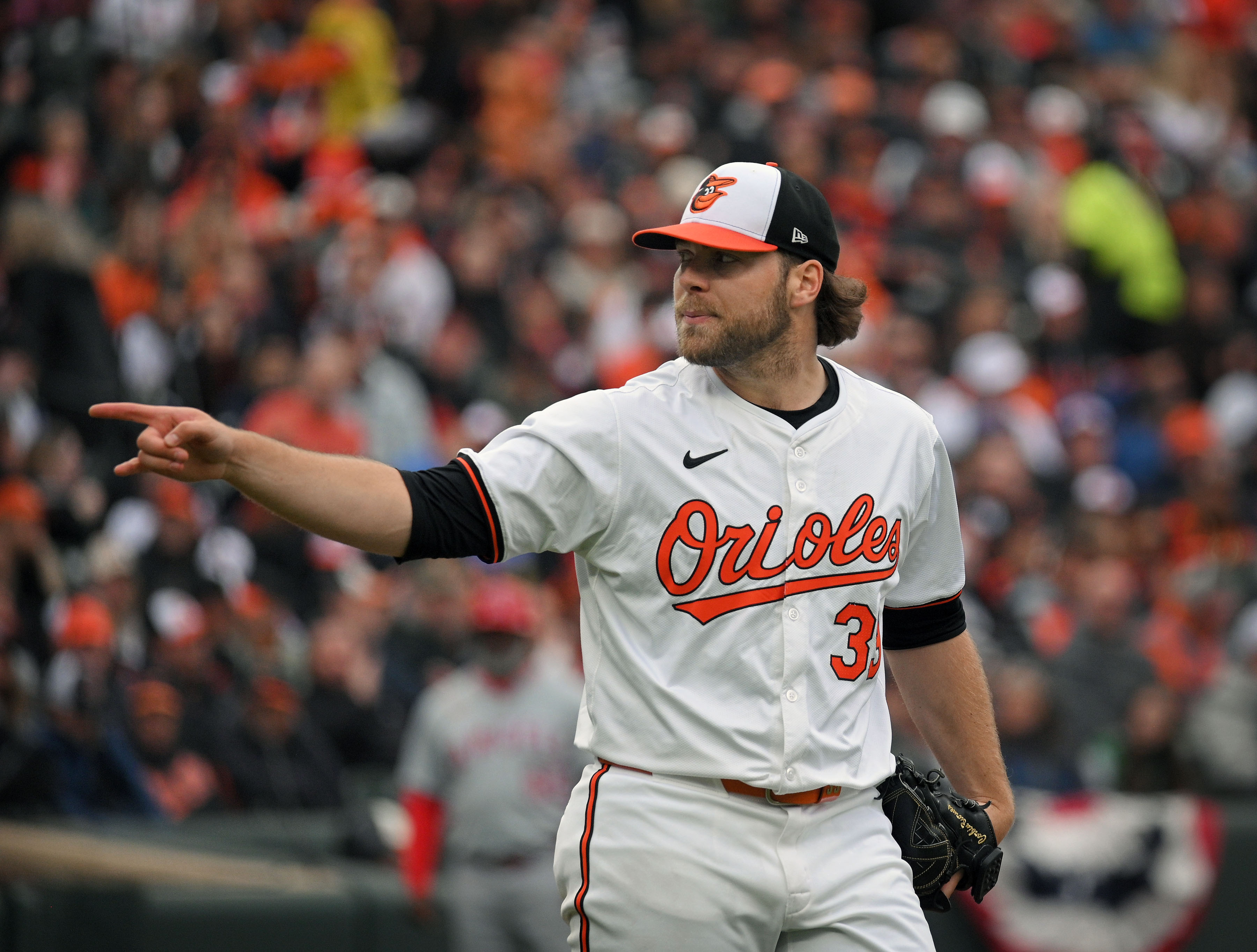 Mar 28, 2024: Orioles starter Corbin Burnes reacts after striking out Angels' Zach Neto in the third inning. Burnes finished with 11 strikeouts in Orioles 11-3 victory in their 2024 season opener at Oriole Park at Camden Yards. (Kenneth K. Lam/Staff)