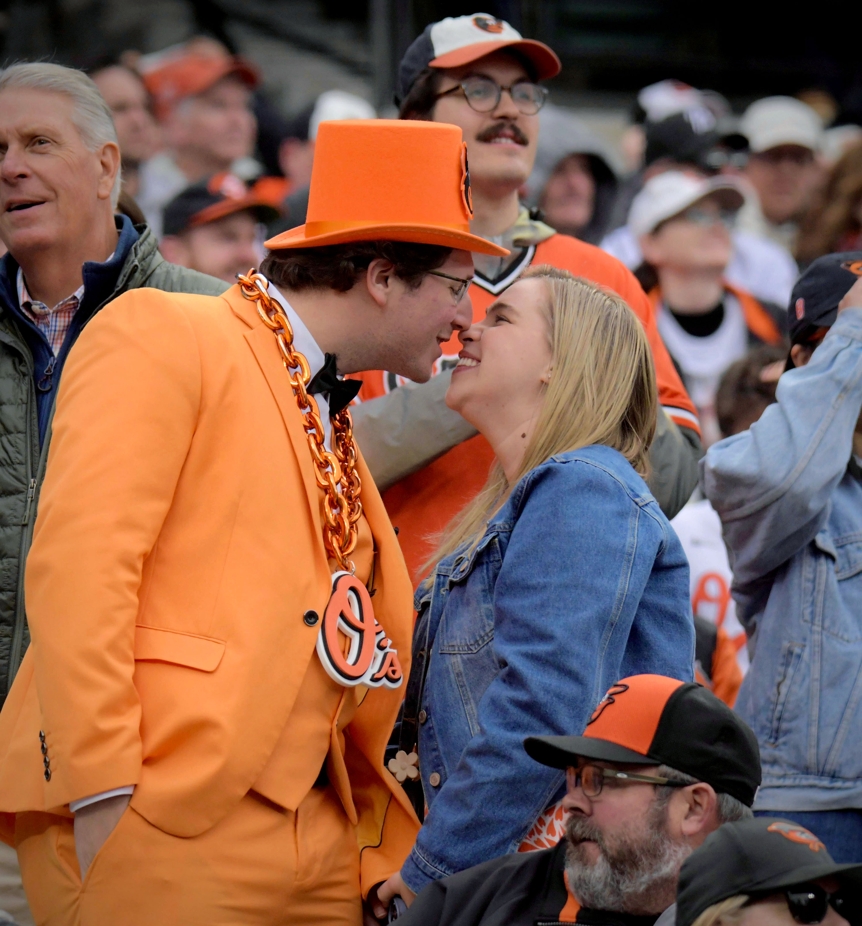 March 28, 2024: Freddie Leatherbury of Catonsville with his girlfriend Rebecca Kazor of Georgetown on opening day as the Orioles take on the Los Angeles Angels at Camden Yards. (Karl Merton Ferron)