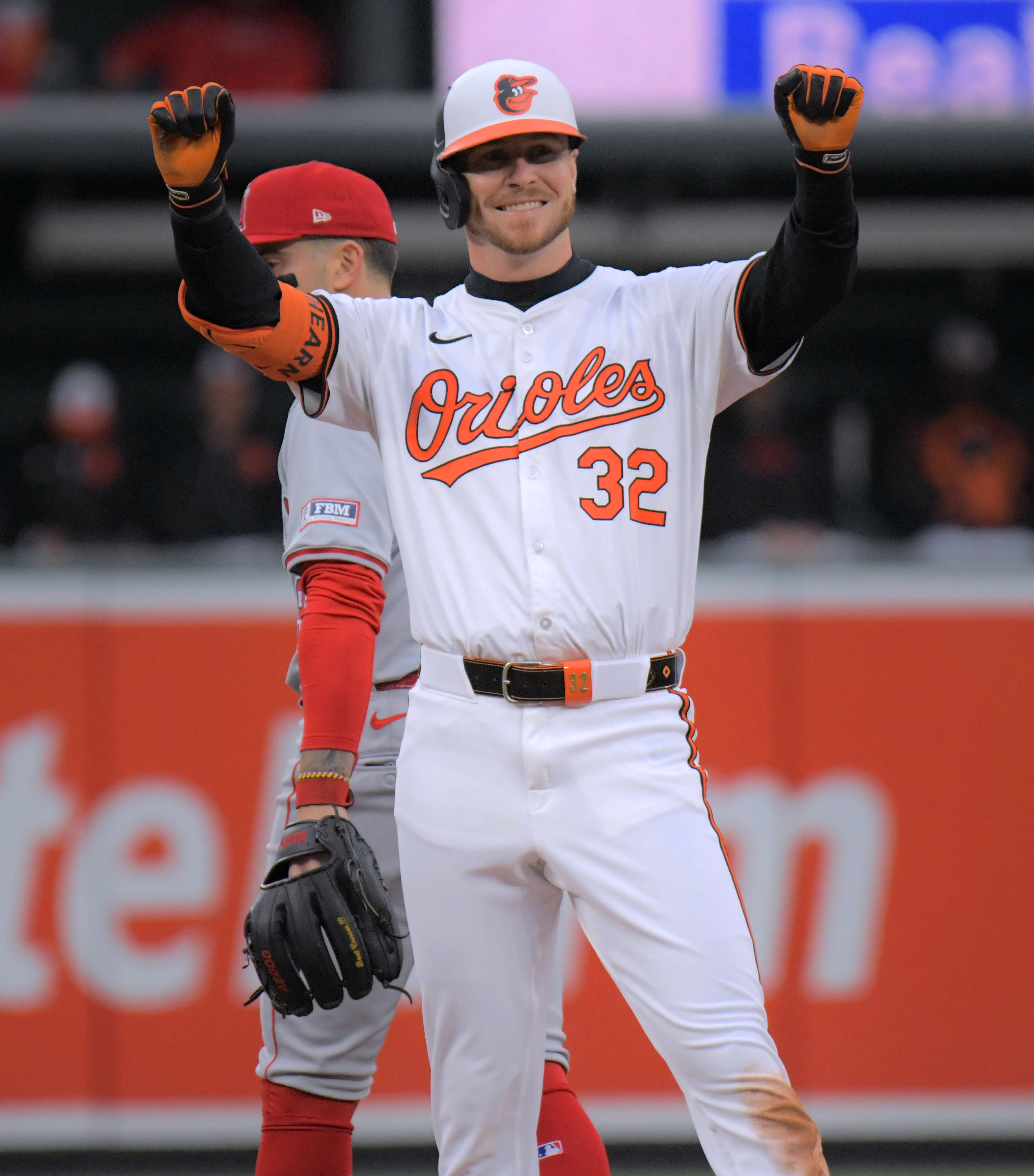 Mar 28, 2024: Baltimore Orioles' Ryan O'Hearn celebrates his pinch hit double against the Los Angeles Angels during opening day of Major League Baseball at Oriole Park at Camden Yards. (Karl Merton Ferron/Staff)
