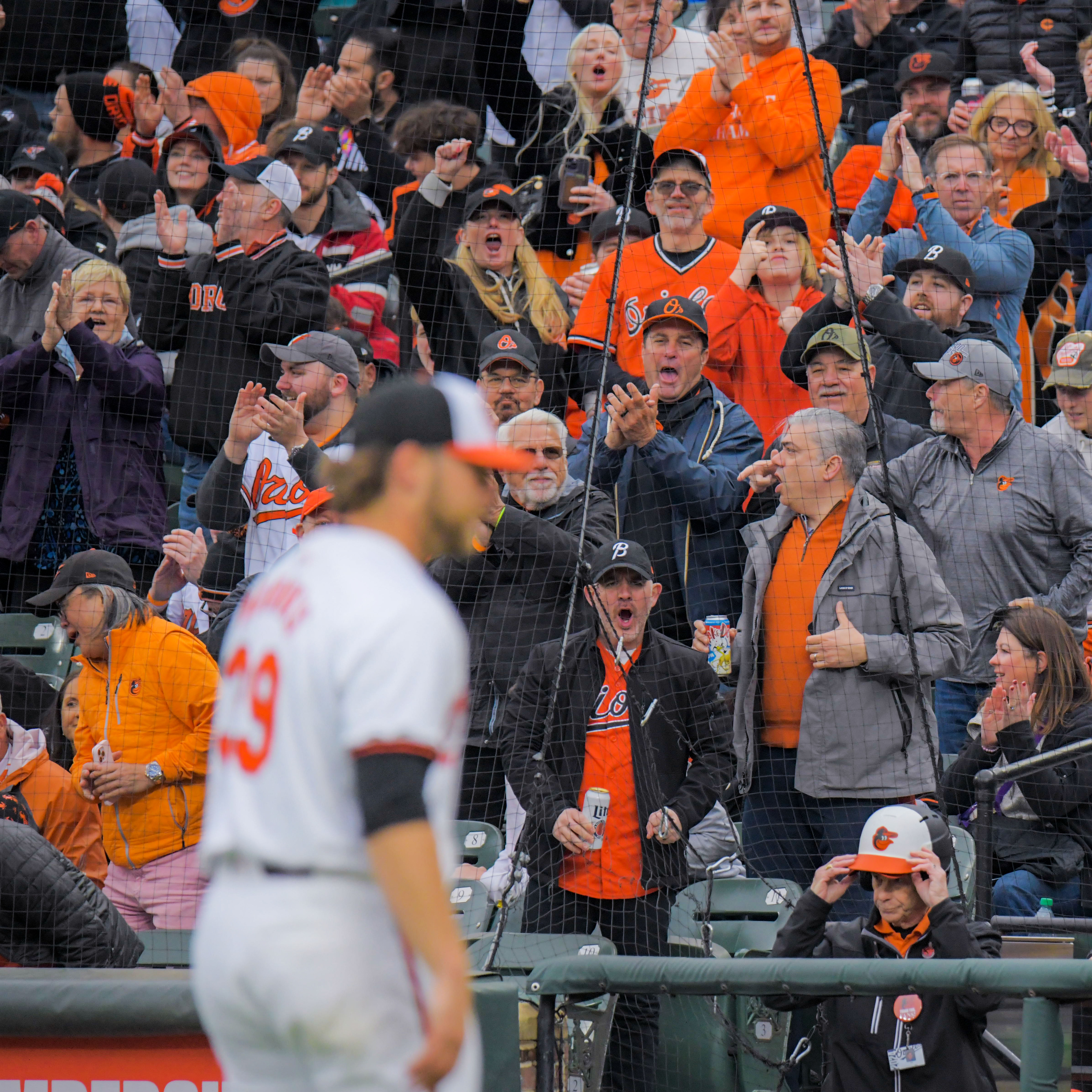 Mar 28, 2024: Fans applaud Baltimore Orioles starting pitcher Corbin Burnes as he finishes his outing against the Los Angeles Angels during opening day of Major League Baseball at Oriole Park at Camden Yards. (Karl Merton Ferron/Staff)