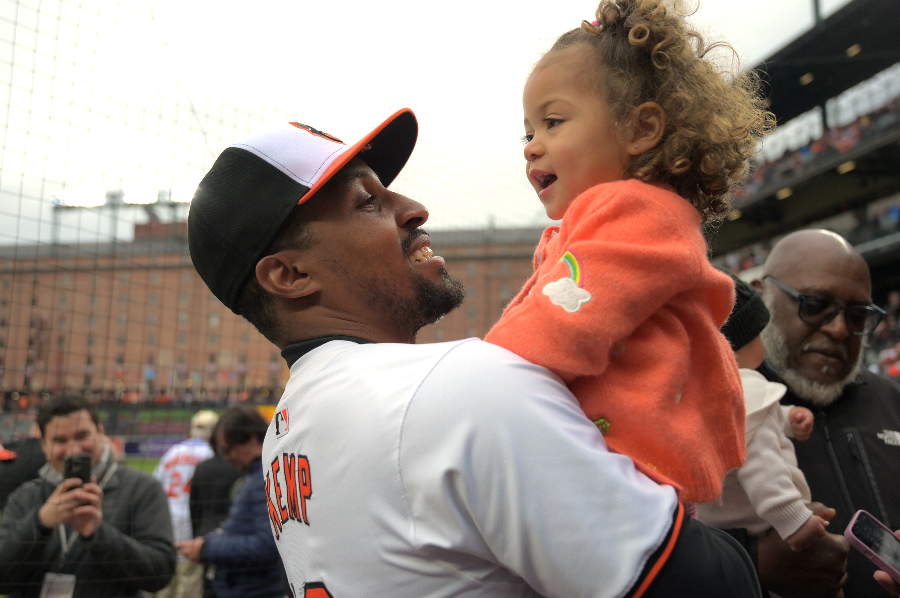 March 28, 2024: Orioles' Tony Kemp with his daughter, McKenna,2, on opening day at Camden Yards. (Karl Merton Ferron/Staff)