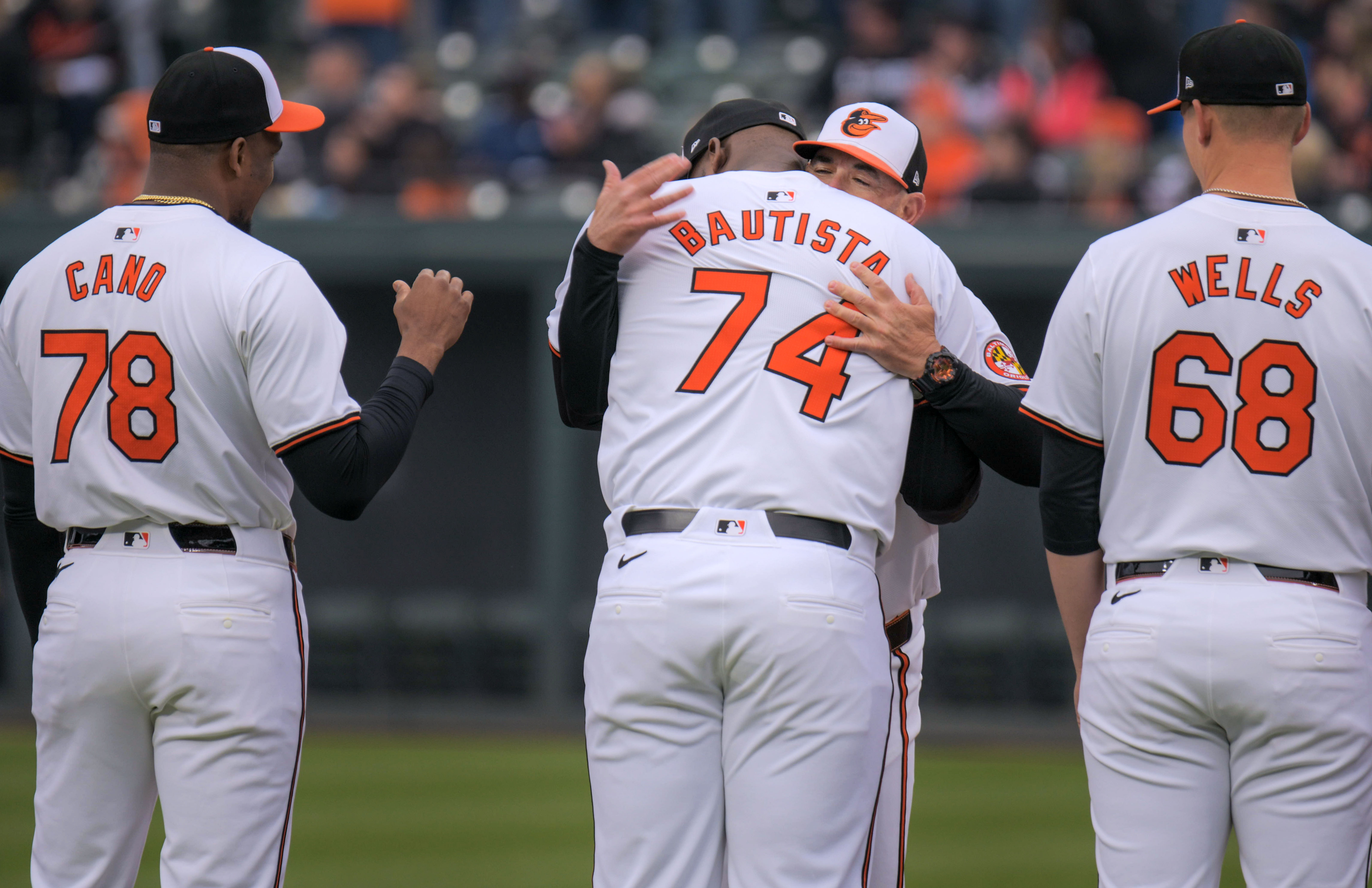 Mar 28, 2024: Baltimore Orioles relief pitcher Felix Bautista gets an embrace from manager Brandon Hyde during opening day of Major League Baseball at Oriole Park at Camden Yards. (Karl Merton Ferron/Staff)