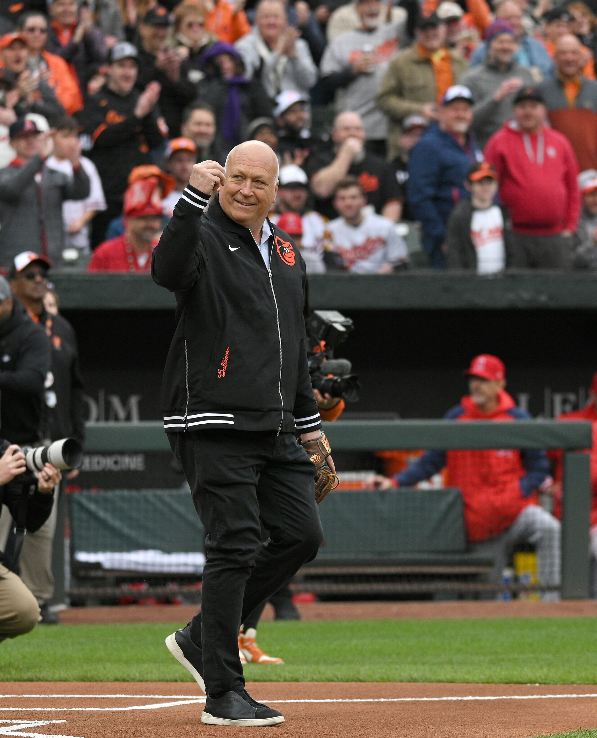 March 28, 2024: Former Orioles player Cal Ripken Jr. walks on the field during opening day ceremonies at Oriole Park at Camden Yards. (Kenneth K. Lam/Staff)