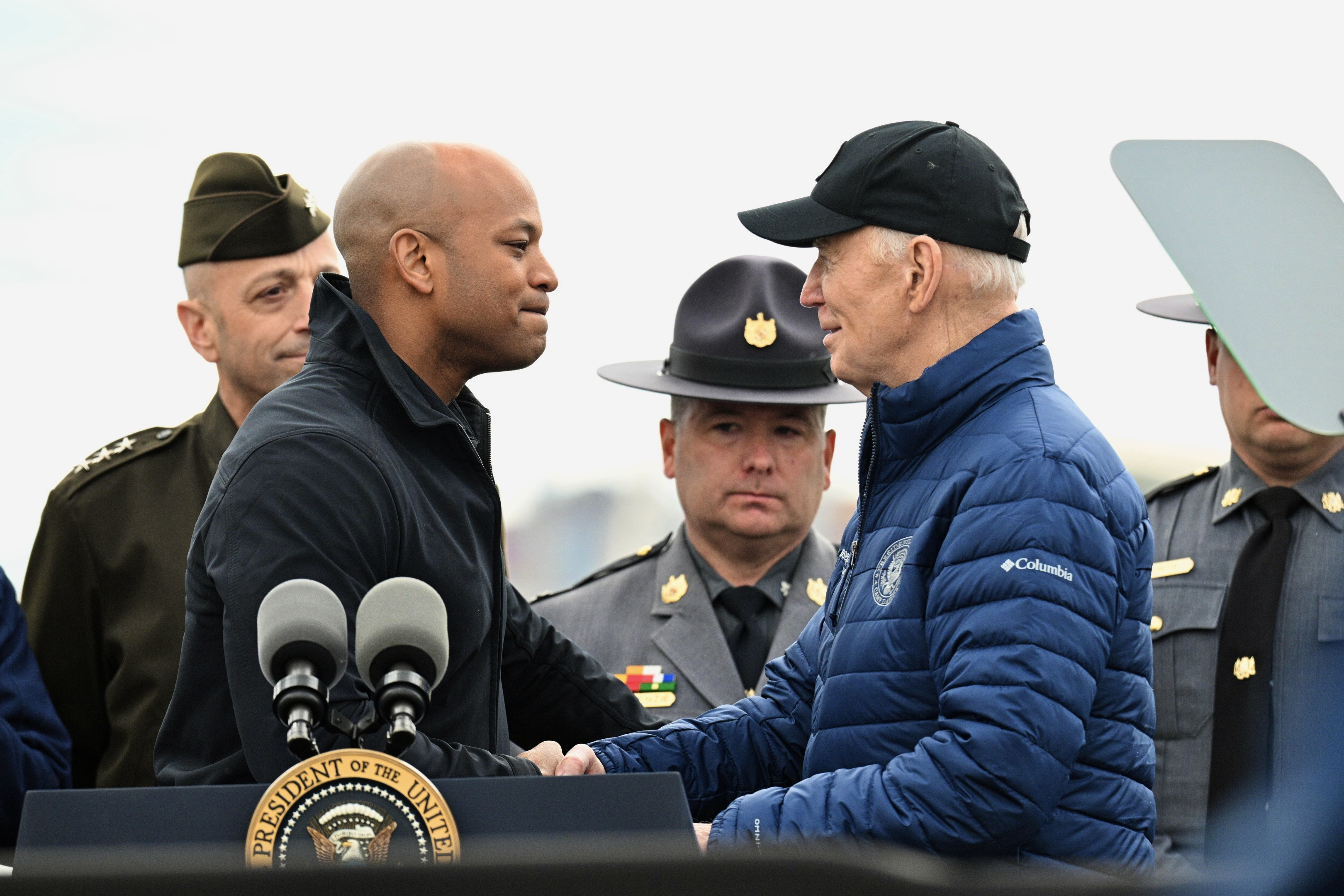 April 5, 2024: Gov. Wes Moore greets President Joe Biden at a news conference in Baltimore after they took an aerial tour of the wreckage site at the Key Bridge. (Jerry Jackson/Staff)