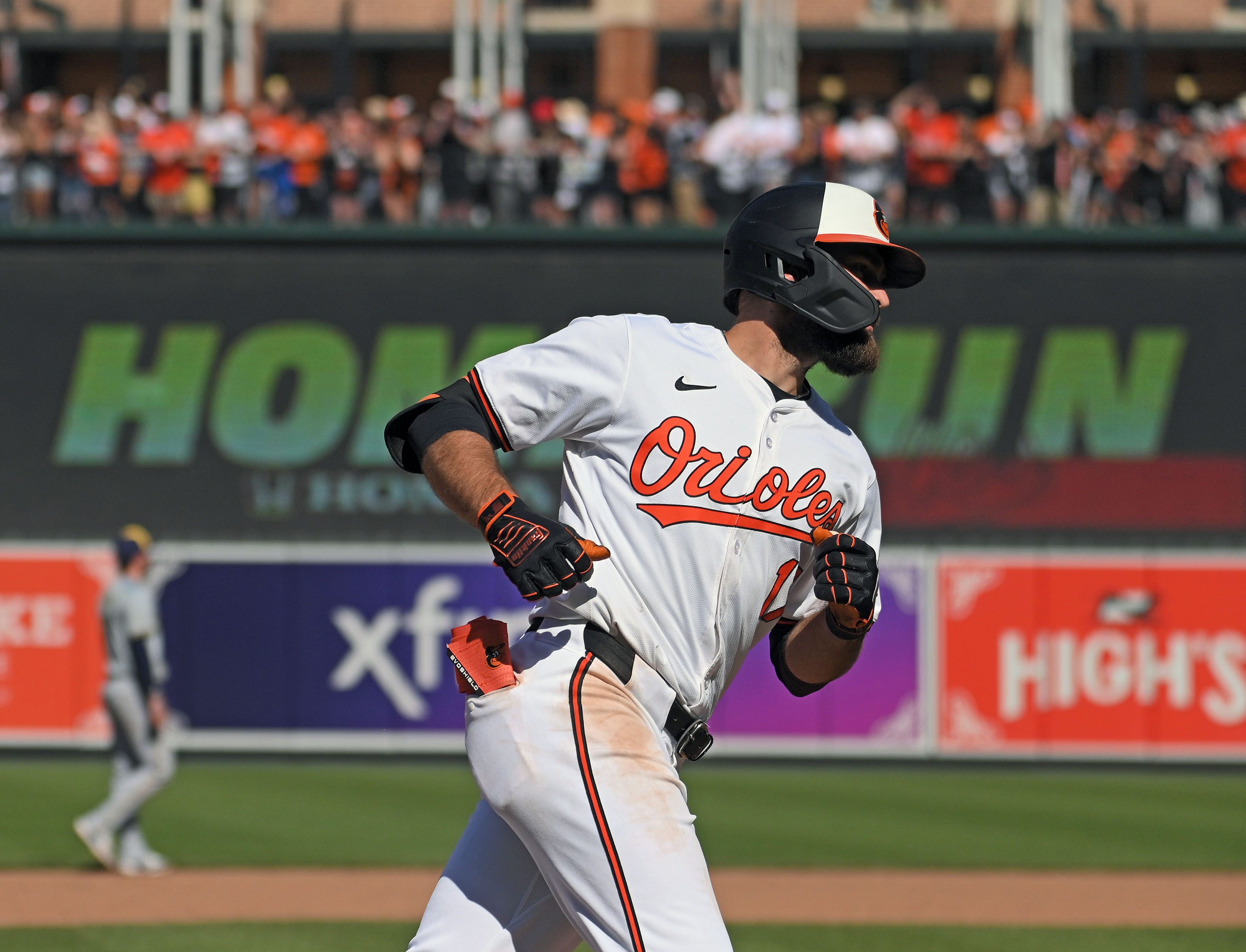 Orioles' Colton Cowser, center, runs the bases after hitting solo homer against pitcher Hoby Milner in the eighth inning. The Orioles defeated the Brewers 6-4 at Oriole Park at Camden Yards. (Kenneth K. Lam/Staff)