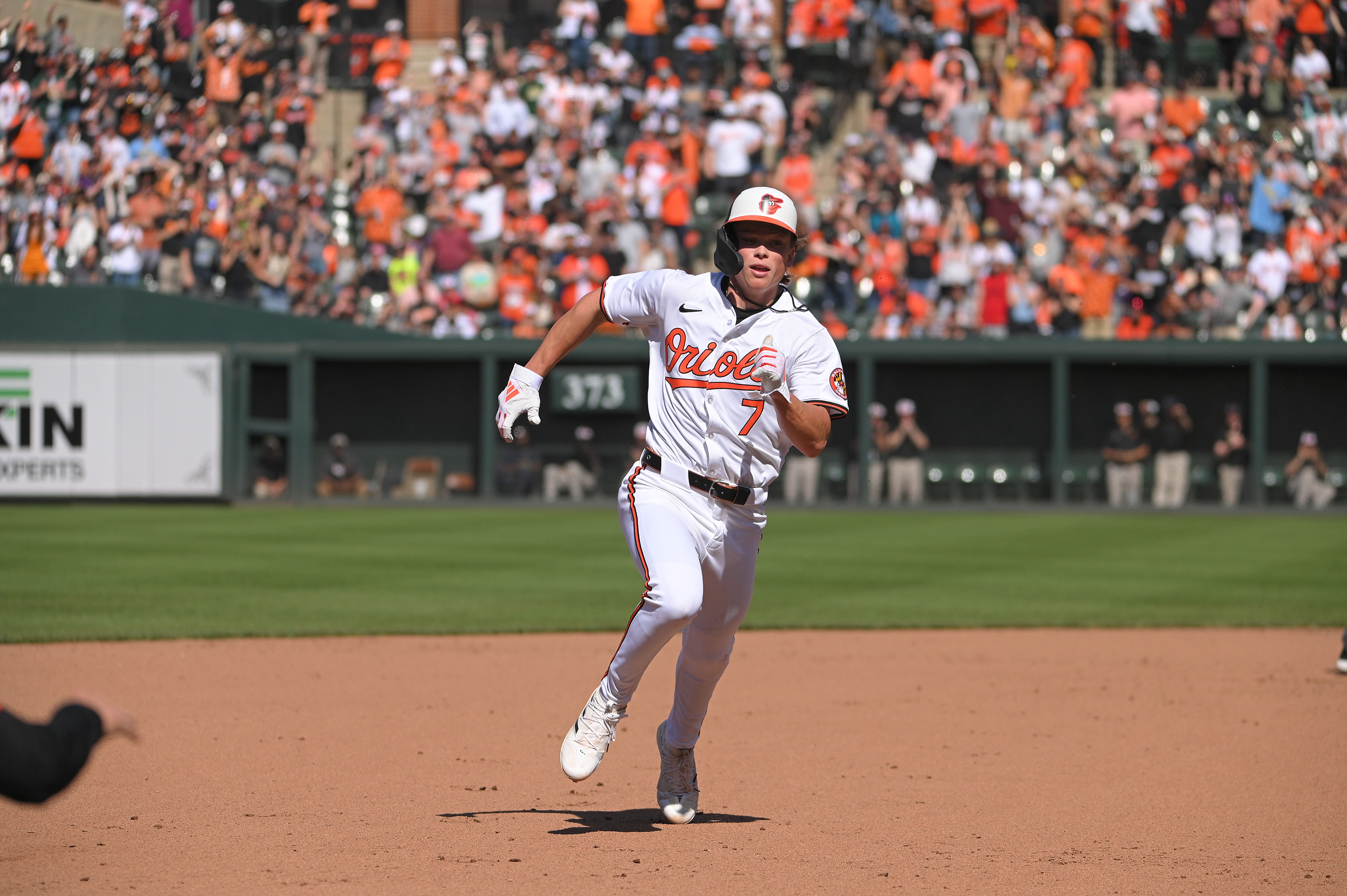 Orioles' Jackson Holliday races to third base on a hit by Gunnar Henderson in the 7th inning after Jackson's first MLB hit in a game against the Milwaukee Brewers. (Kenneth K. Lam/staff)