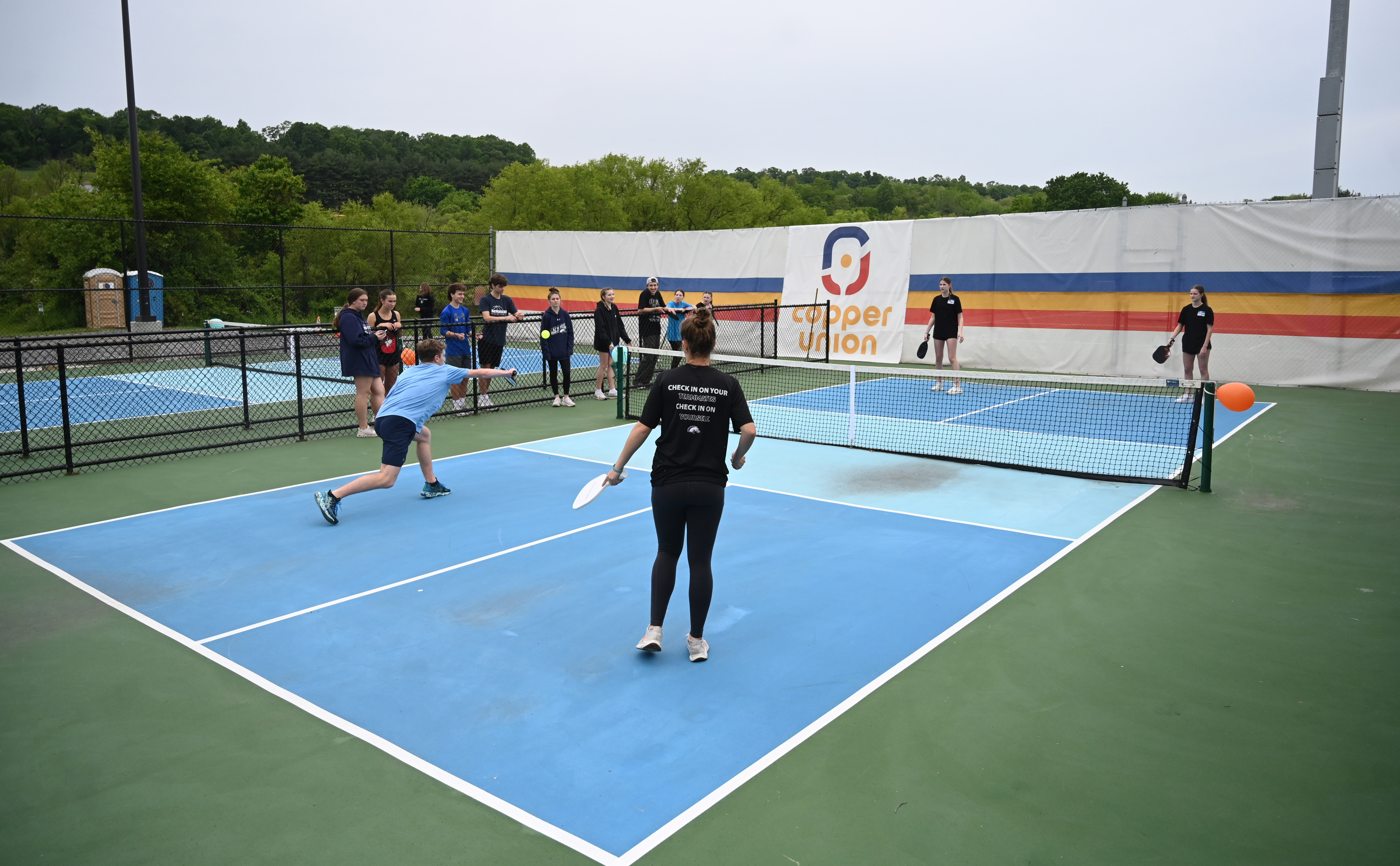 Teams take part in a pickleball tournament at Coppermine 4 Seasons on Tuesday. The tournament was organized by Manchester Valley High School juniors Brady Bonney and Leigh Hoke to raise money and support for Morgan's Message, a nonprofit supporting student-athlete mental health initiatives. (Brian Krista/staff photo)