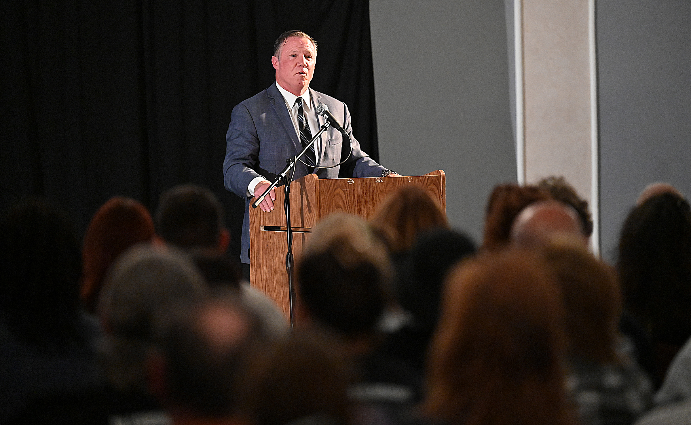 Tim Weber, Community Education Liaison for the States Attorney's Office, introduces Brian Kimmel, who gave "A Recovery Perspective" at the 9th Annual Drug Overdose and Prevention Vigil Tuesday at Portico at St. John in Westminster. (Jeffrey F. Bill/Staff photo)