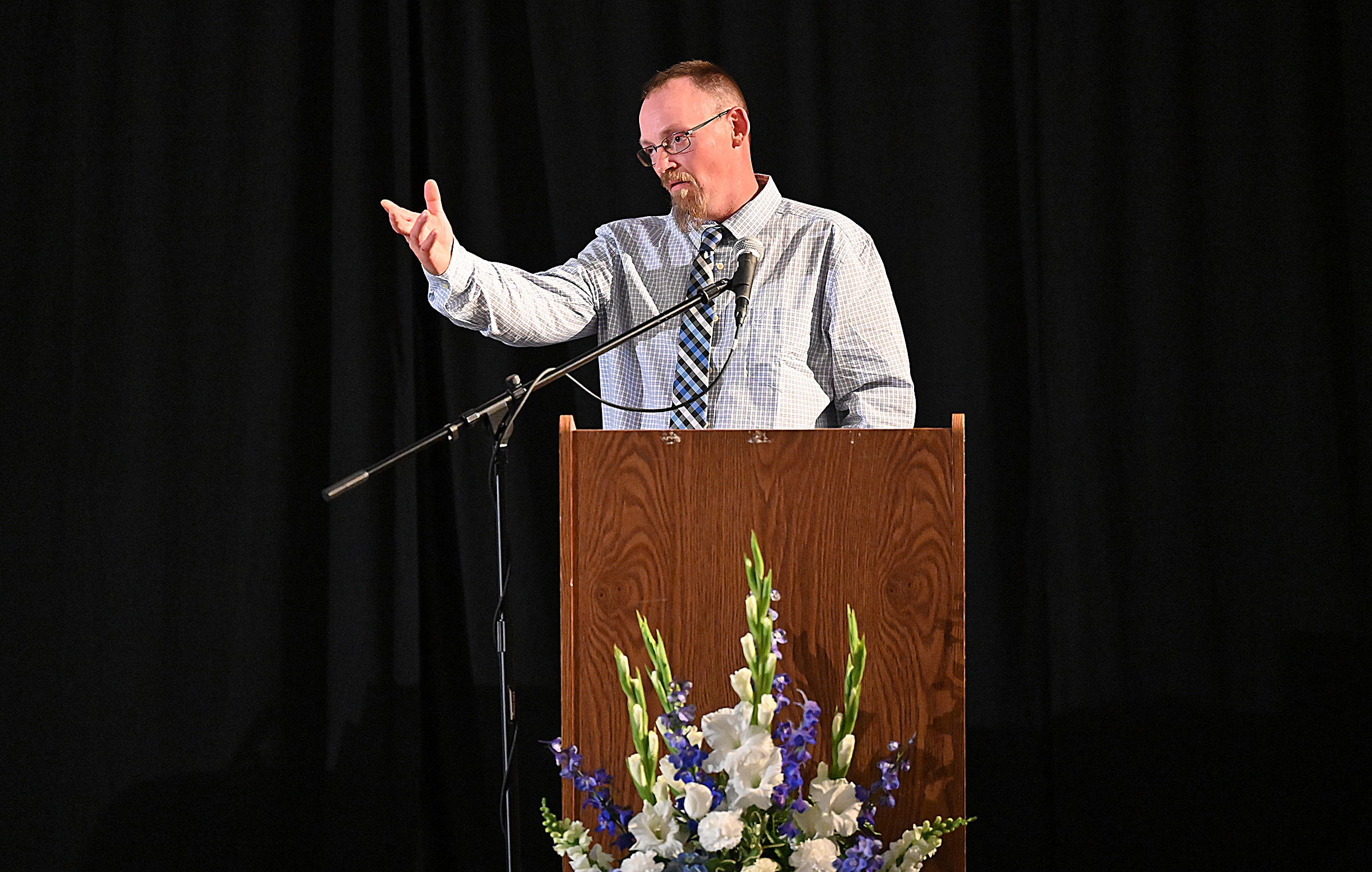 Brian Kimmel, gives his father recognition while offering "A Recovery Perspective" at the 9th Annual Drug Overdose and Prevention Vigil Tuesday at Portico at St. John in Westminster. (Jeffrey F. Bill/Staff photo)