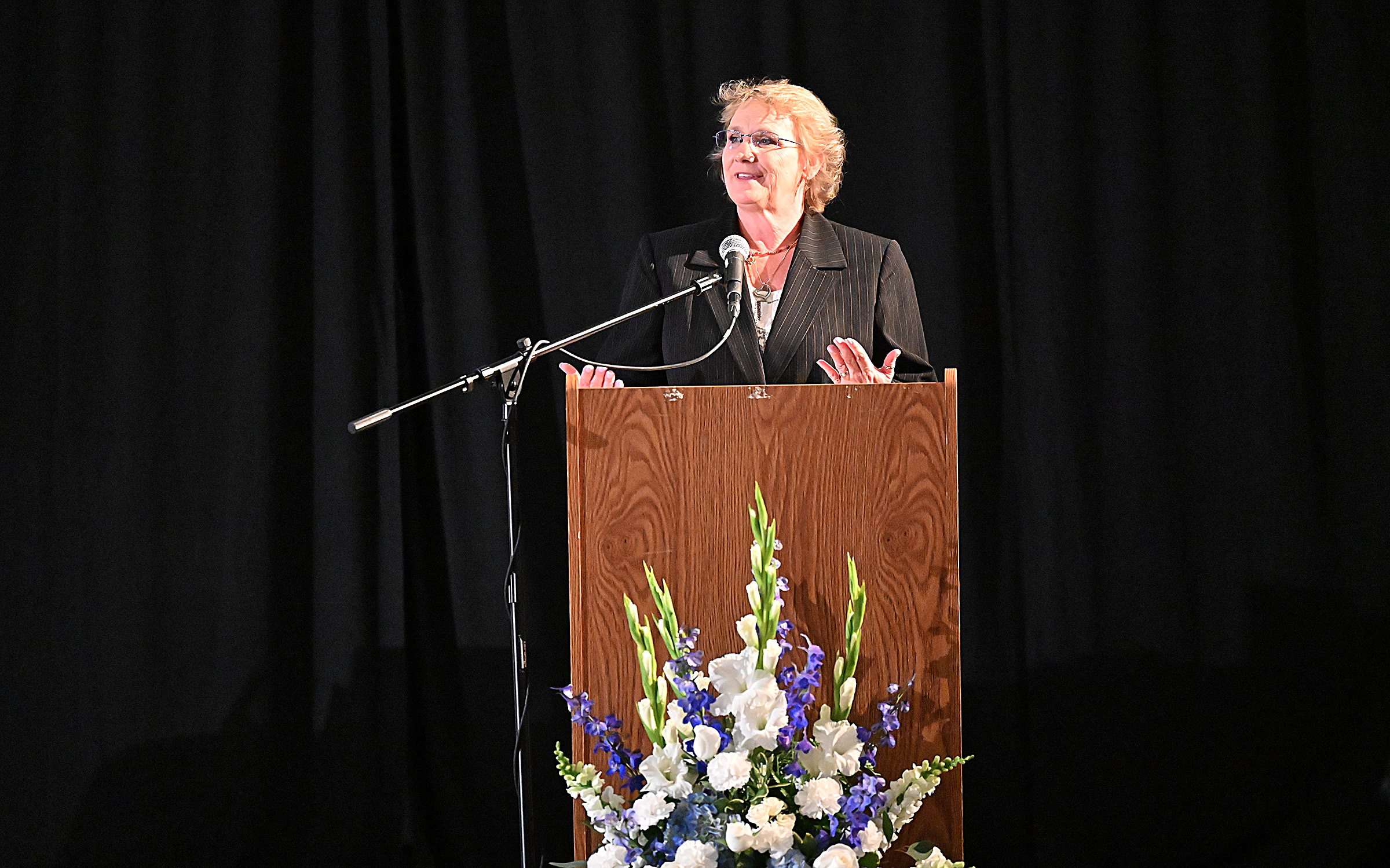 Beth Schmidt offers "A Family's Perspective" at 9th Annual Drug Overdose and Prevention Vigil Tuesday at Portico at St. John in Westminster. (Jeffrey F. Bill/Staff photo)