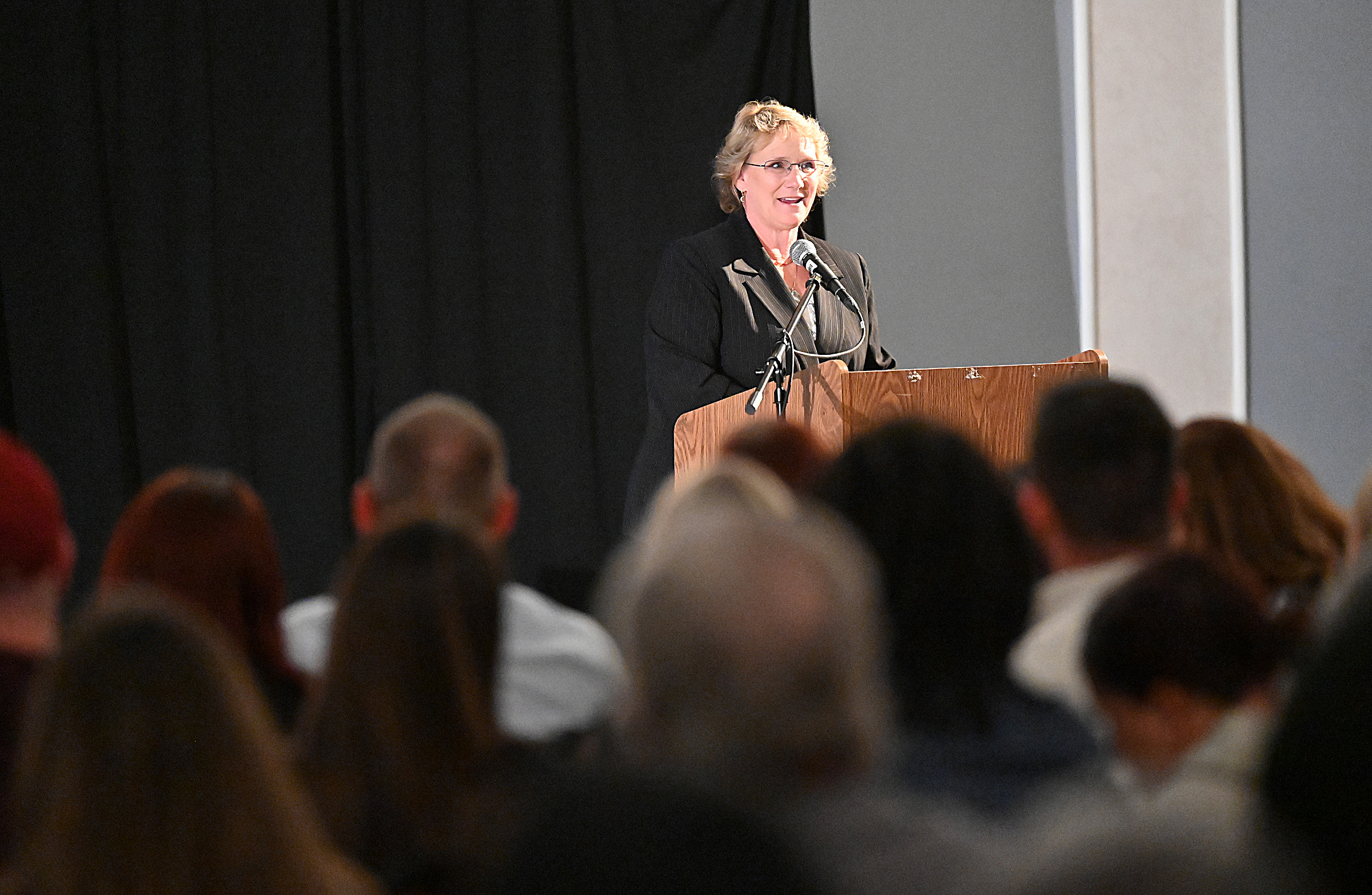 Beth Schmidt offers "A Family's Perspective" at 9th Annual Drug Overdose and Prevention Vigil Tuesday at Portico at St. John in Westminster. (Jeffrey F. Bill/Staff photo)