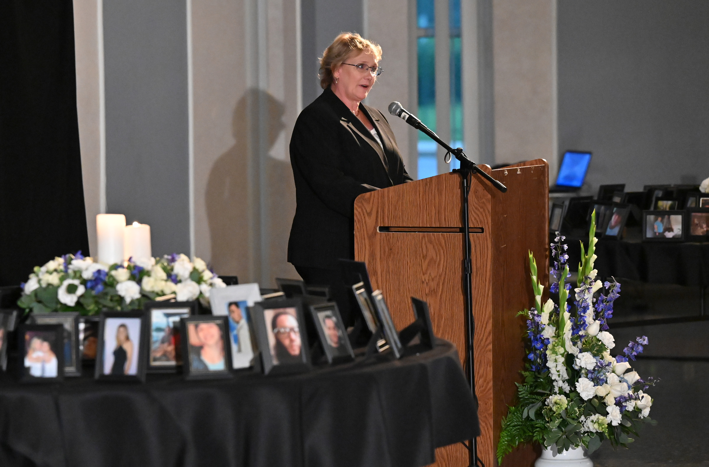 Beth Schmidt offers "A Family's Perspective" at 9th Annual Drug Overdose and Prevention Vigil Tuesday at Portico at St. John in Westminster. (Jeffrey F. Bill/Staff photo)